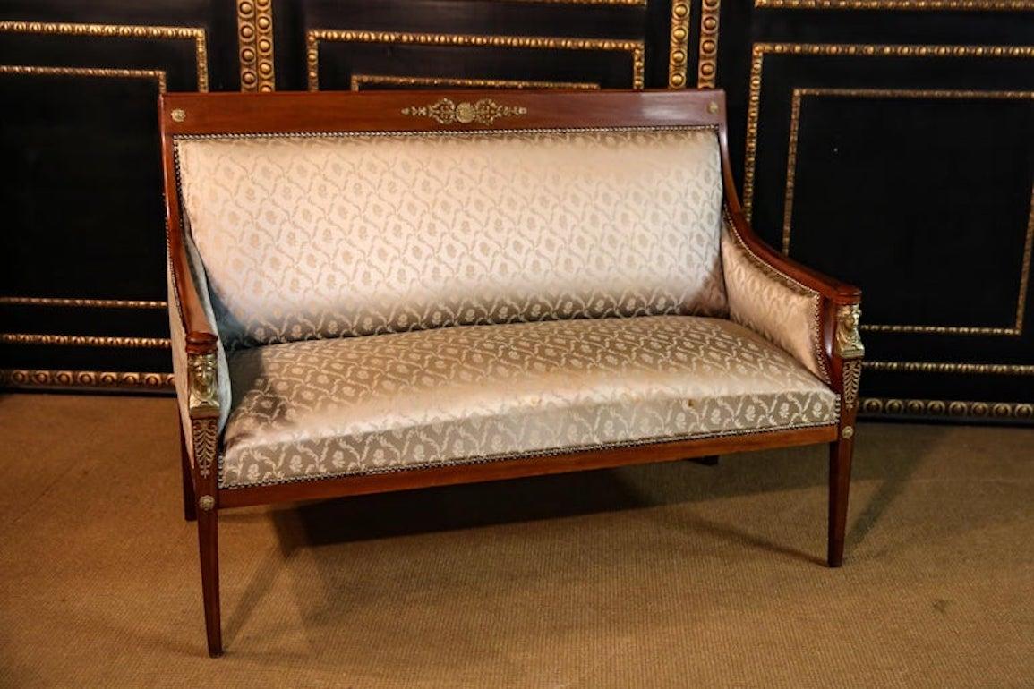 Original Empire sofa circa 1860-1870 from an Empire room.
Massive mahogany cast with Empire caryadites bronze.
Top condition.

Measurments:
width:140cm
Height: 100cm
Depht: 80cm.