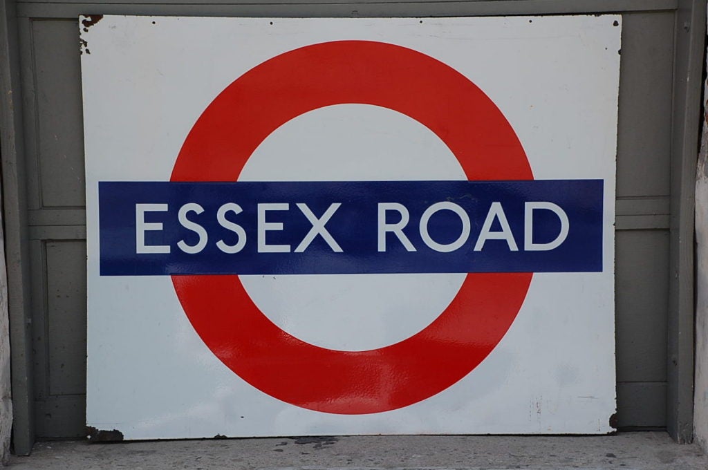 Original enameled London underground subway sign. Essex Road station. Stamped BURNHAM & CO. LONDON.