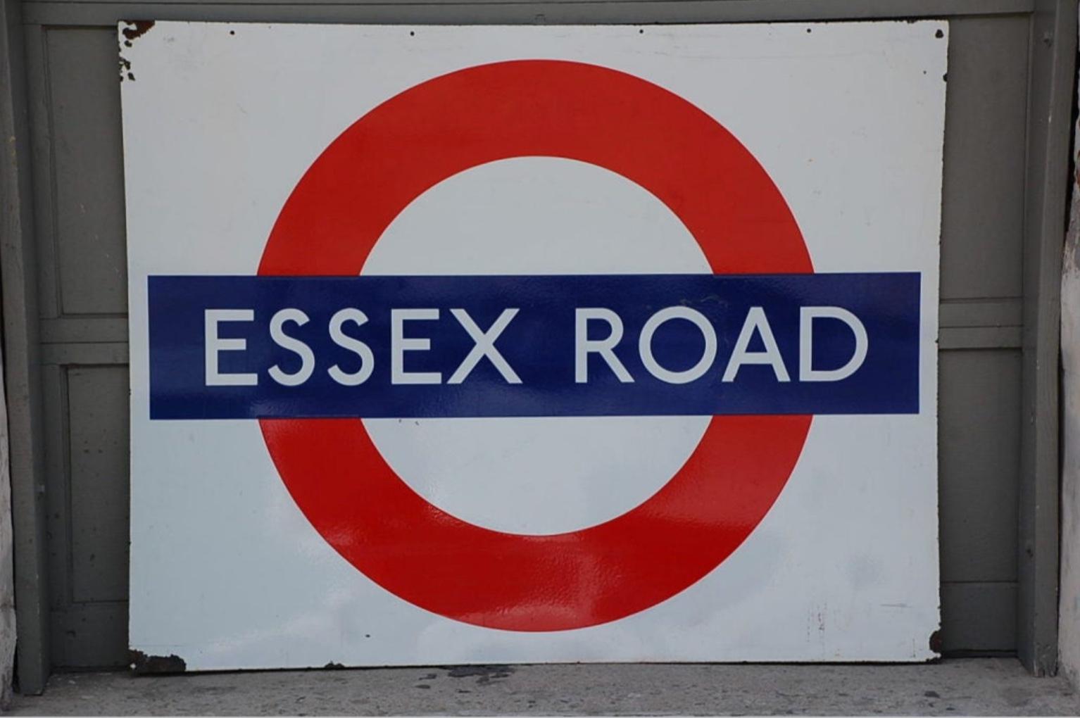Original enameled London underground subway sign. Essex Road station. Stamped BURNHAM & CO. LONDON.