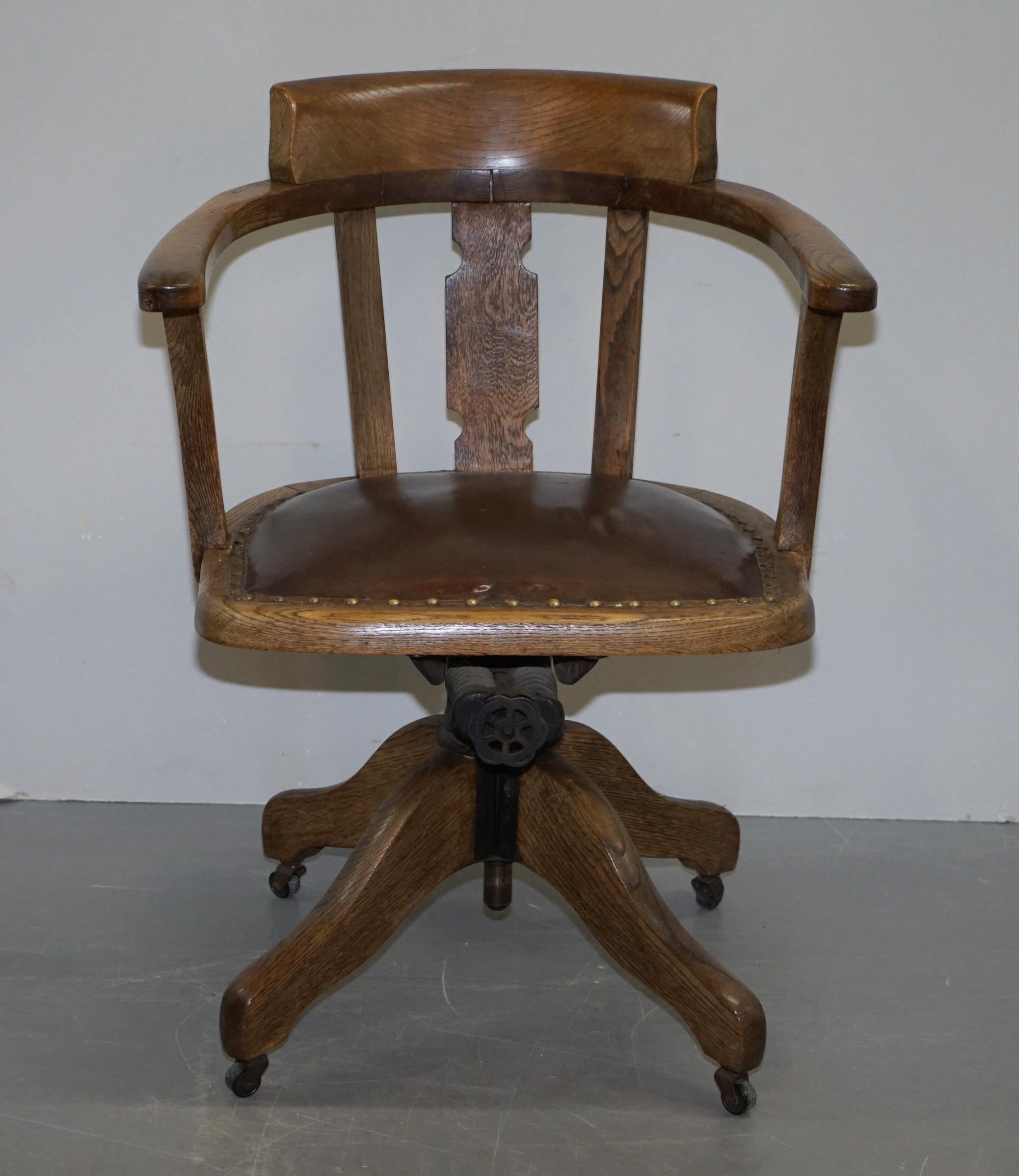 We are delighted to offer for sale this restored circa 1900 directors armchair 

This chair is really quite exquisite, it has a tiger oak frame which means the timber was cut on the bias to give it that lovely stripy tiger patina. the seat is the