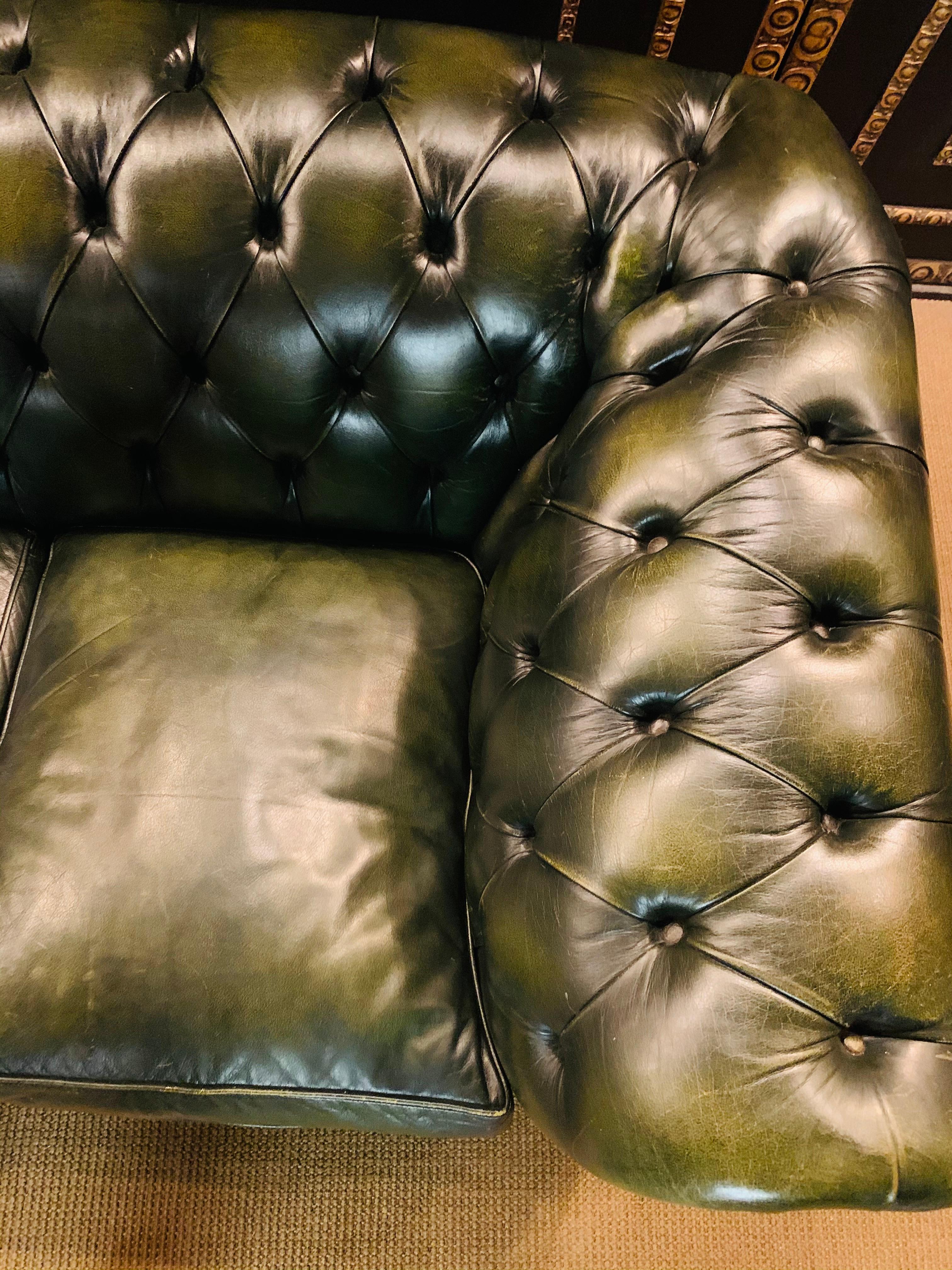 emerald green leather sofa