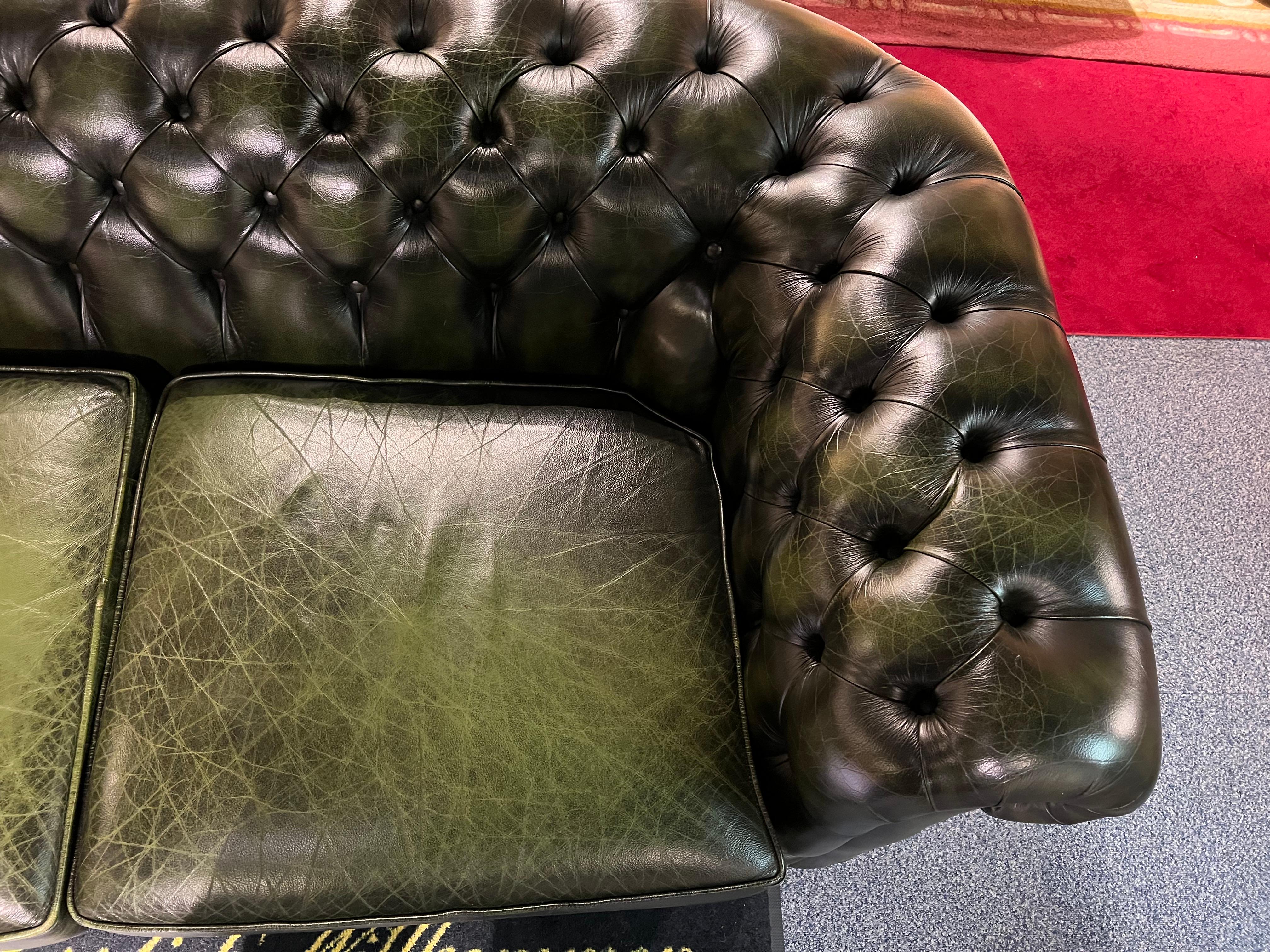 green leather chesterfield sofa