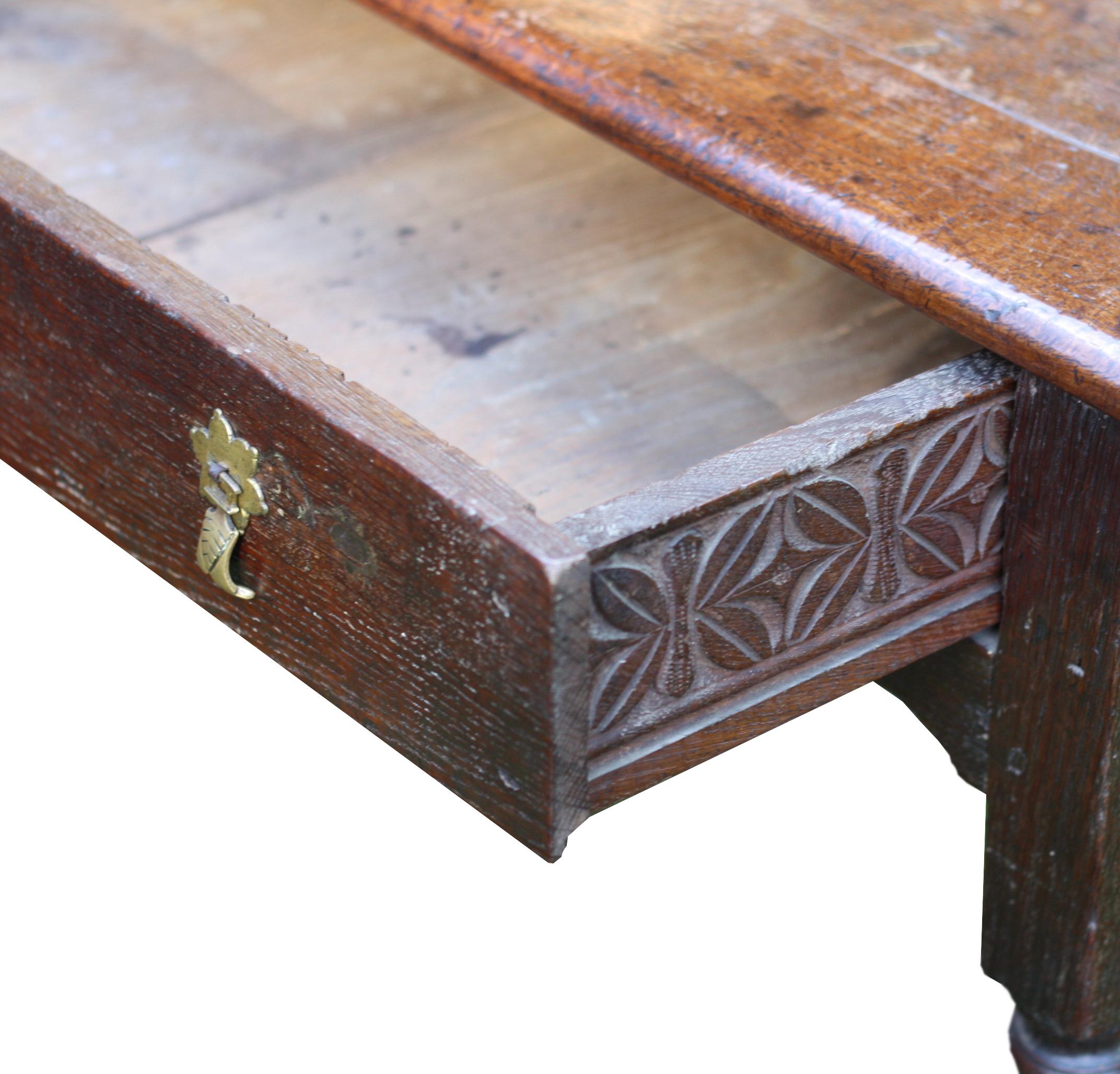 A wonderfully rare English Jacobean period oak side table.

Its appears to be all original and not made up from other pieces. It's understood that 17th century furniture makers often worked side by side with individuals making such items as