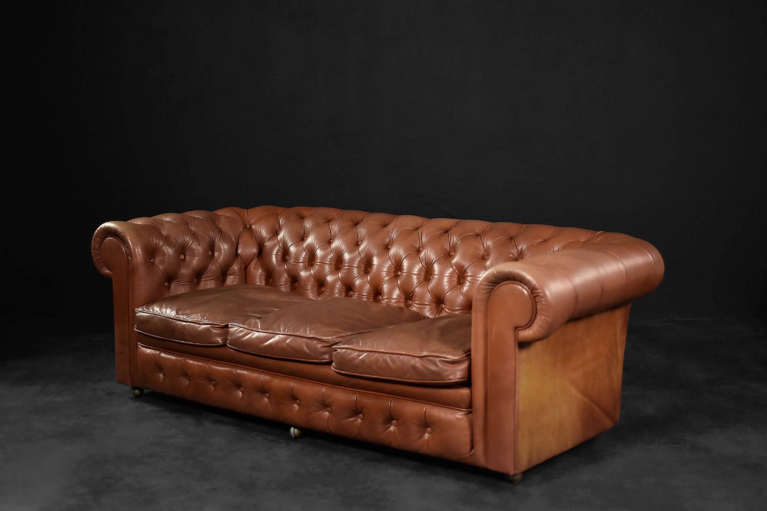 British Original English Large Leather Chesterfield Sofa with Shepherd Wheels 