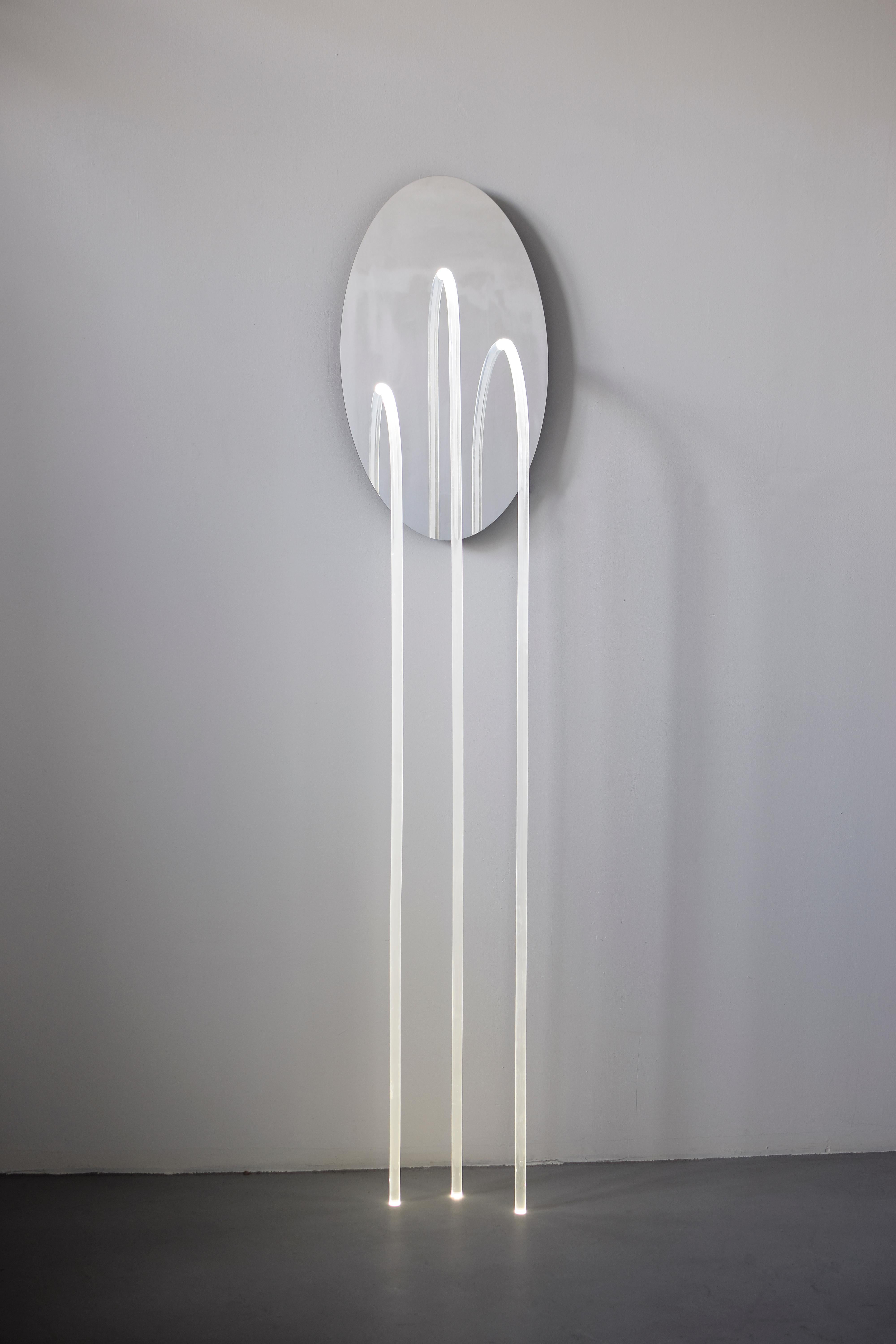 Original enlightened wall mirror, Maximilian Michaelis
 
Title: The elusive nature of perception, No. 06

Measures: ca. 40 x 200 x 30 cm

Material: polished stainless steel, Belgian bluestone, acrylic glass, Led

The basis and inspiration