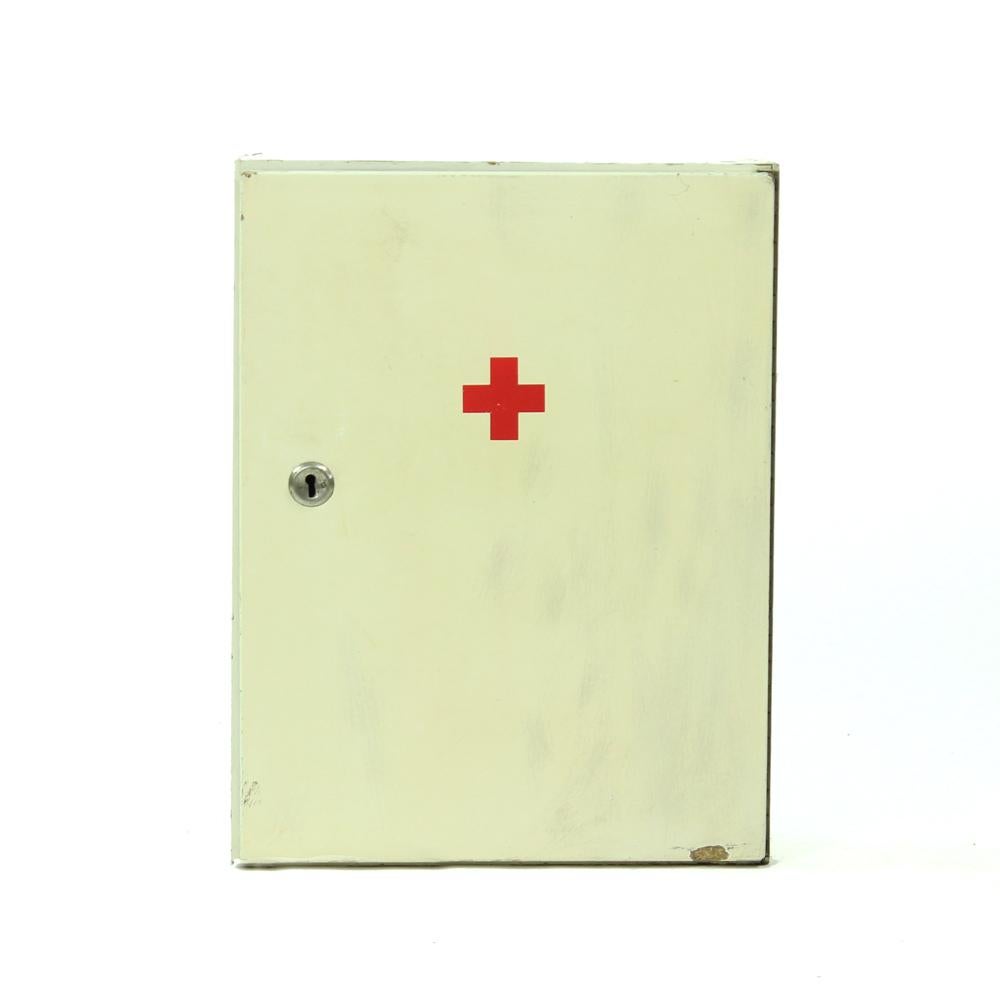 Great and true industrial item. Original factory first aid unit used since 1960s until 1980s in Czechoslovakia. Original condition with original paint and some wear. Still fully functional. Made of wood and plywood. Good condition with visible wear.
