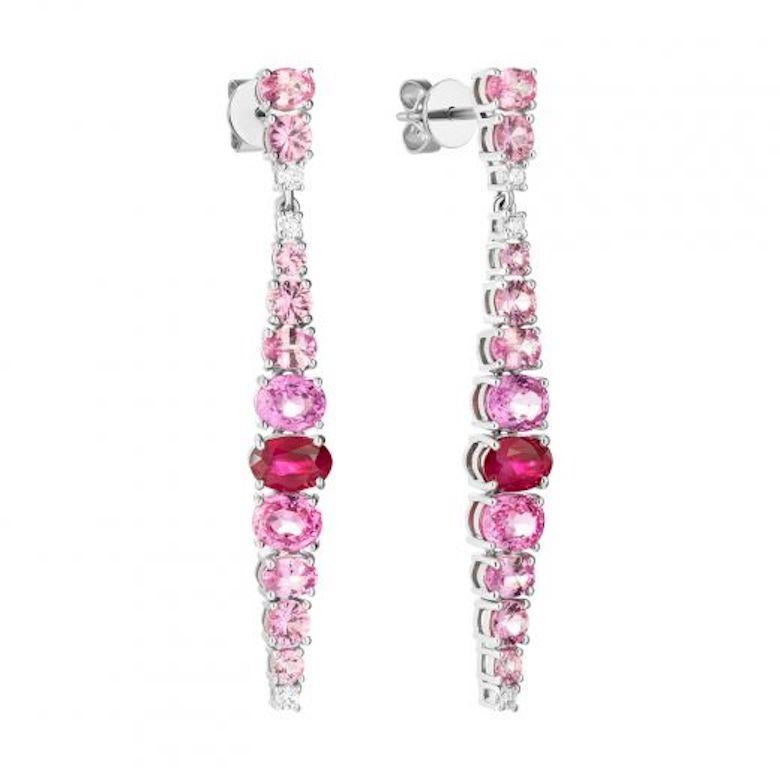 Ring White Gold 14 K (Matching Earrings Available)
Diamond 
Ruby 
Pink Sapphire
Weight 1.88 grams
US size 7


With a heritage of ancient fine Swiss jewelry traditions, NATKINA is a Geneva based jewellery brand, which creates modern jewellery