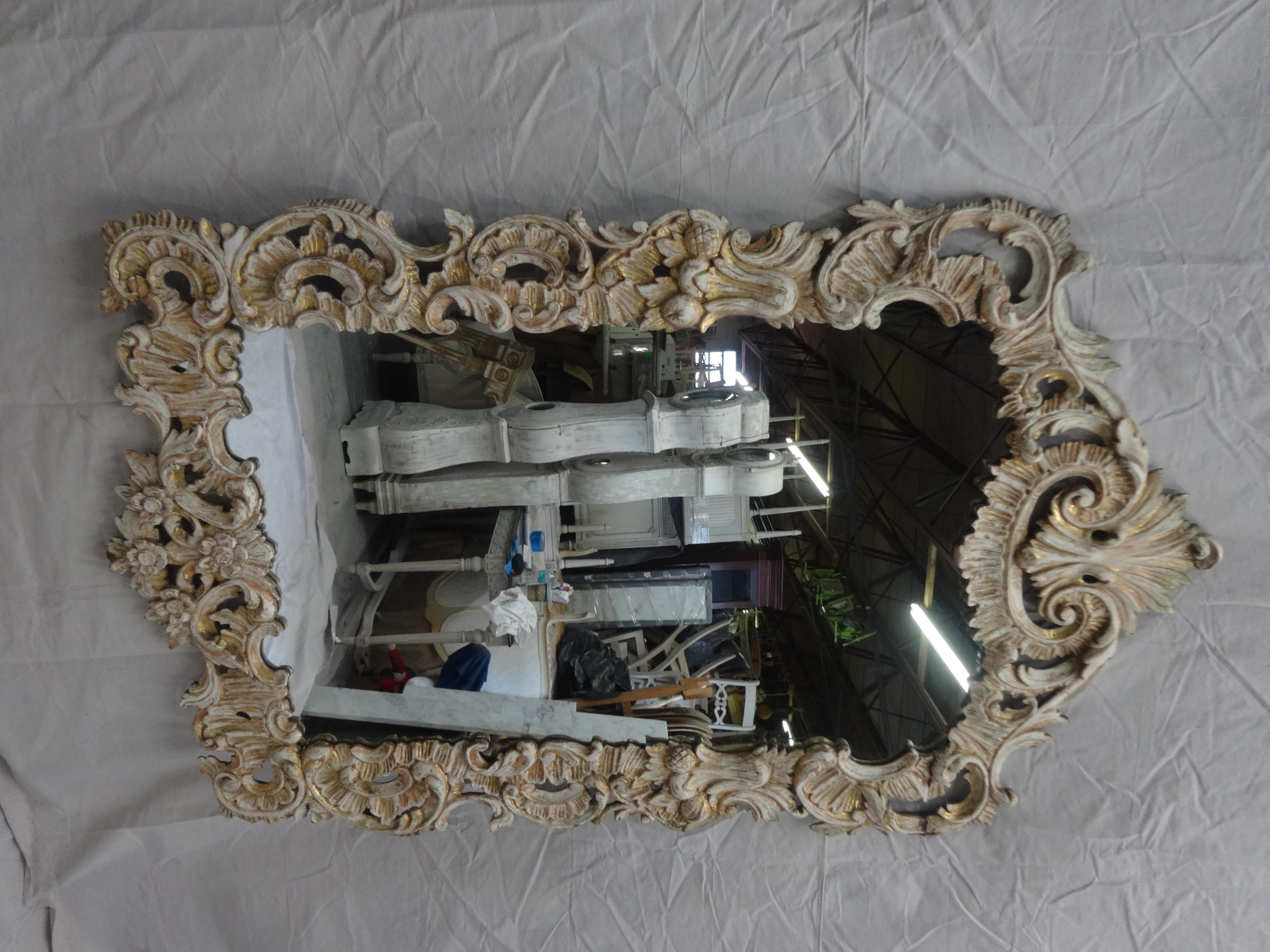 This is an original finish Rococo mirror in excellent shape.