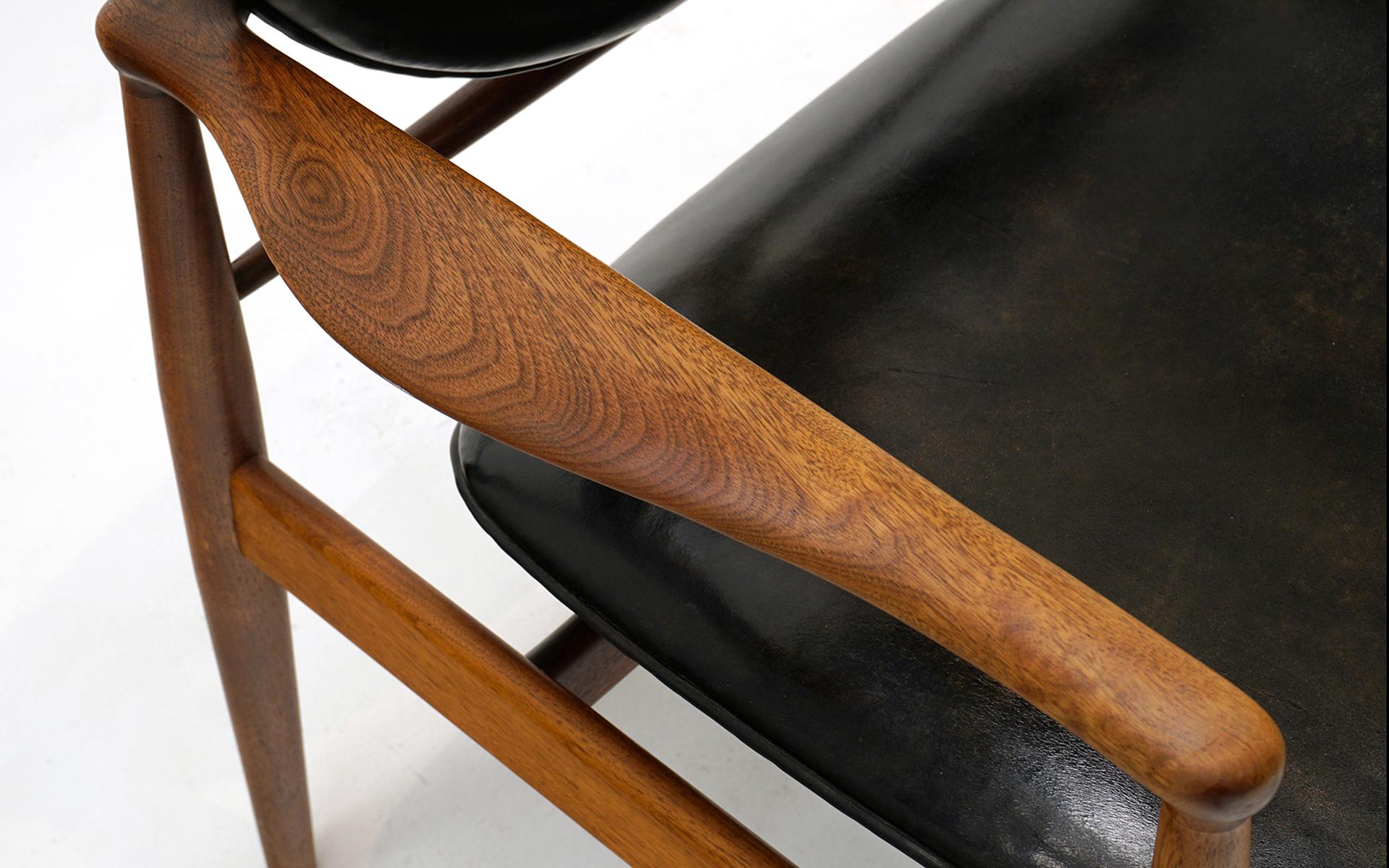 American Original Finn Juhl Model 48 Chair for Baker. Black Leather, Teak Frame. Signed.