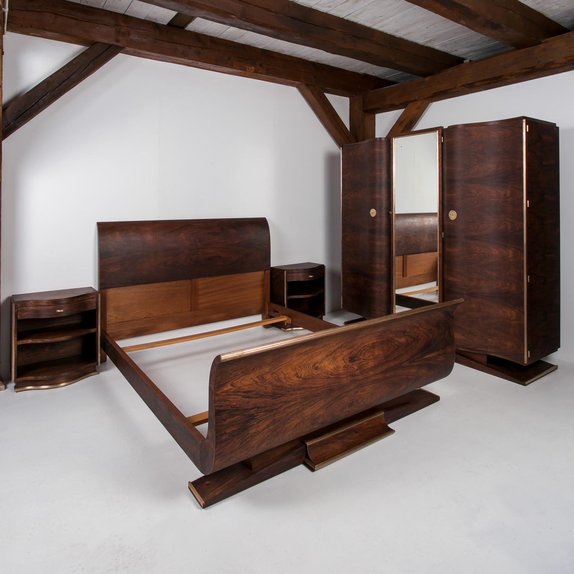 This magnificent Bedroom Set comes from France and was made around 1920s. It consist of 4 elements - bed, big wardrobe with mirror and two night stands. The whole set was thoroughly checked for technical functionality. Wooden surfaces have been