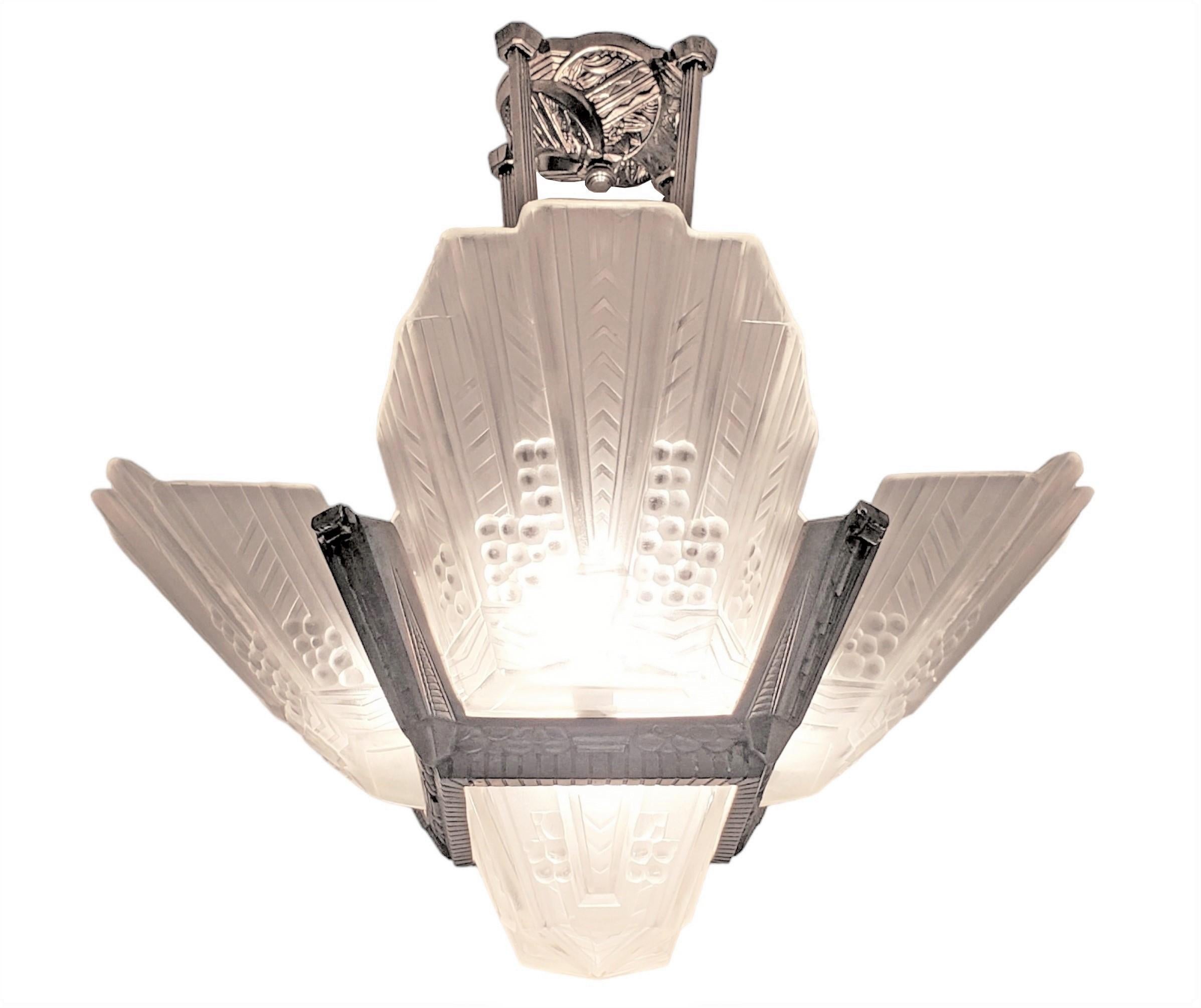  
Fabulous French Art Deco geometric motif chandelier featuring four frosted and molded art glass panels with stylized wheat design,  chevron, stepped tops and polished details,
 attributed to EJG,  Etablissements Jean Gauthier. 
The architectural