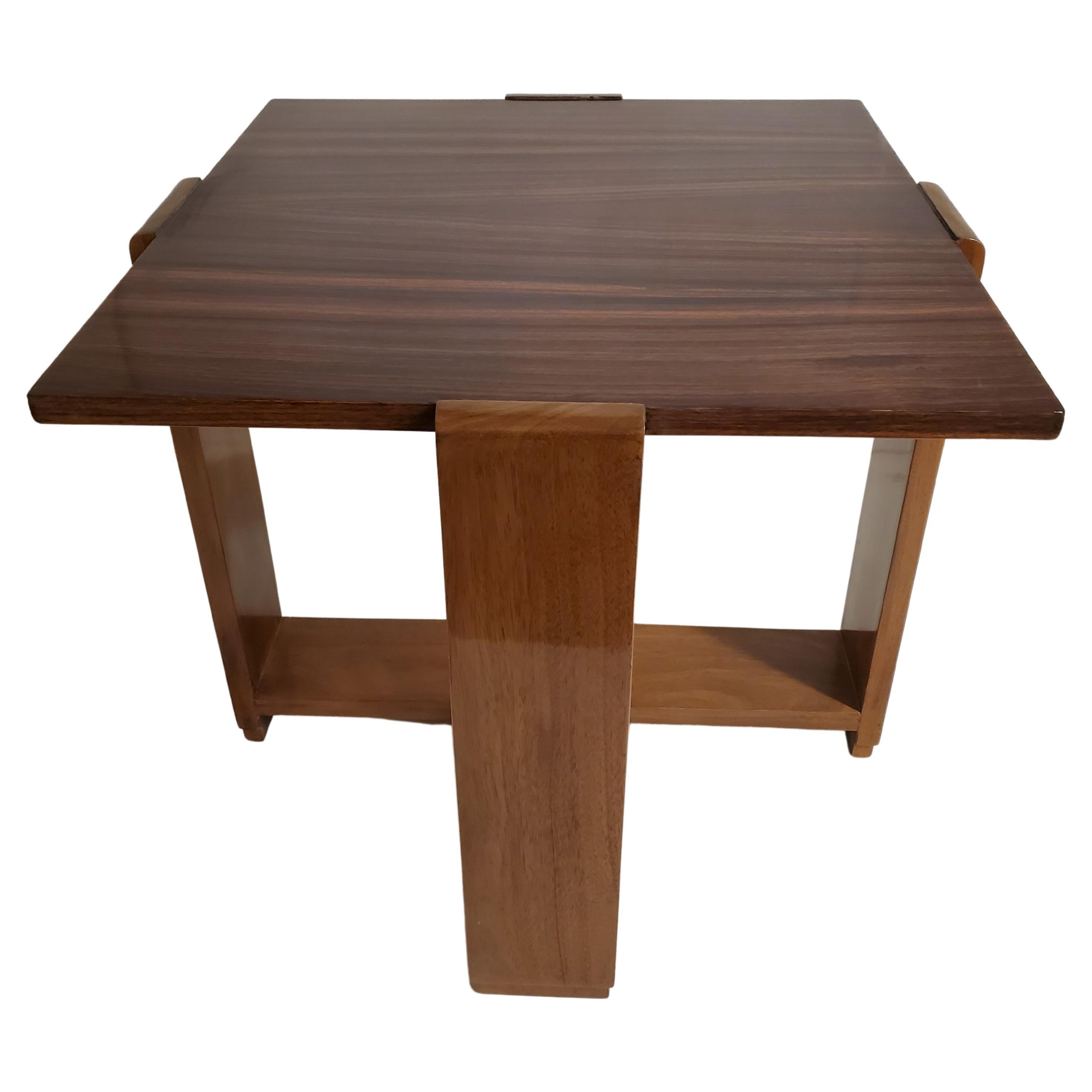 Fine French Modernist highly architectural and artistic macassar ebony square table, attributed to Michel Roux-Spitz
A fully grained macassar ebony square top is supported by four walnut slat legs ending with bullnose tops that support a wide plank