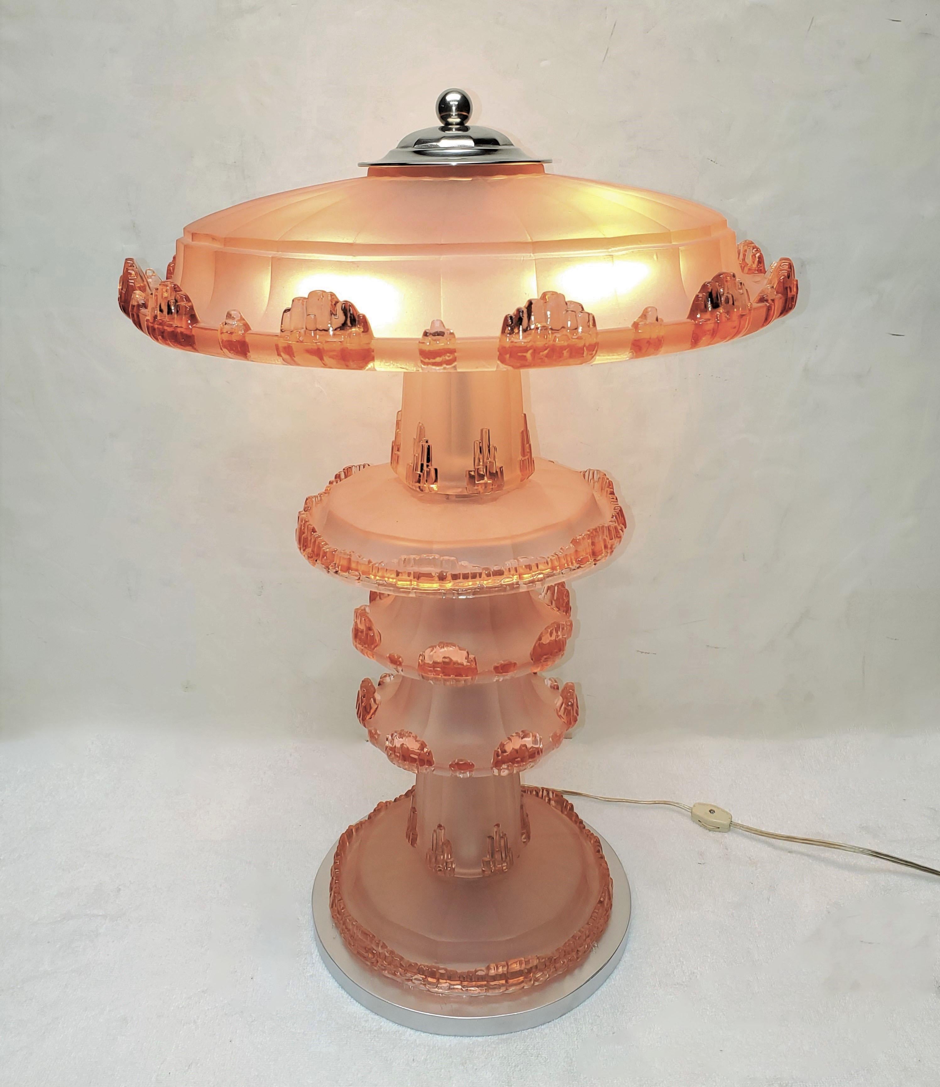 A fine French Art Deco pink / peach / living coral, flesh tinted frosted art glass table lamp, by Etablisseme Jean Gauthier, EJG. 
Extracting ideas from elements of nature, multi tiers of glass with polished accents, drip like water in a series of