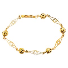 Original French Bracelet with Handmade 14 Karat Gold Links and Cut Out Beads