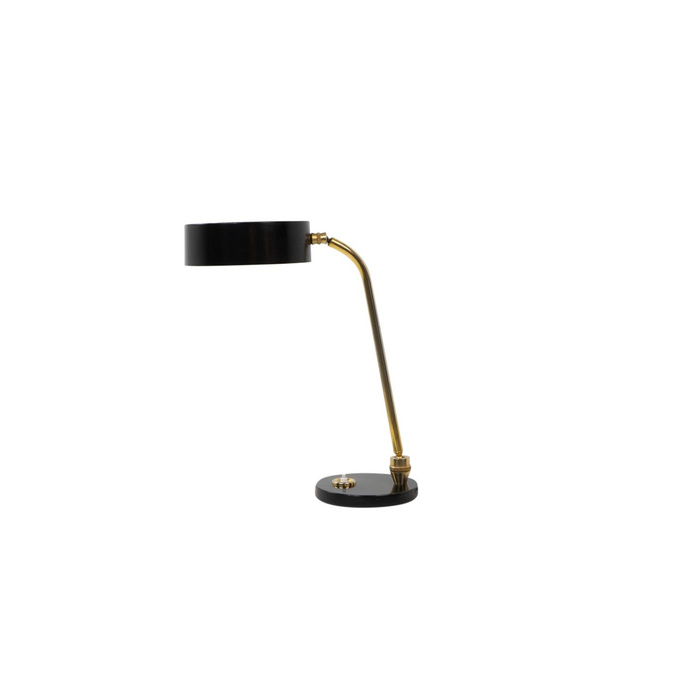 The Charlotte Perriand Jumo desk lamp is a remarkable piece by the iconic designer Charlotte Perriand. Created in collaboration with the renowned French lighting brand Jumo, this desk lamp combines Perriand's modernist aesthetics with Jumo's