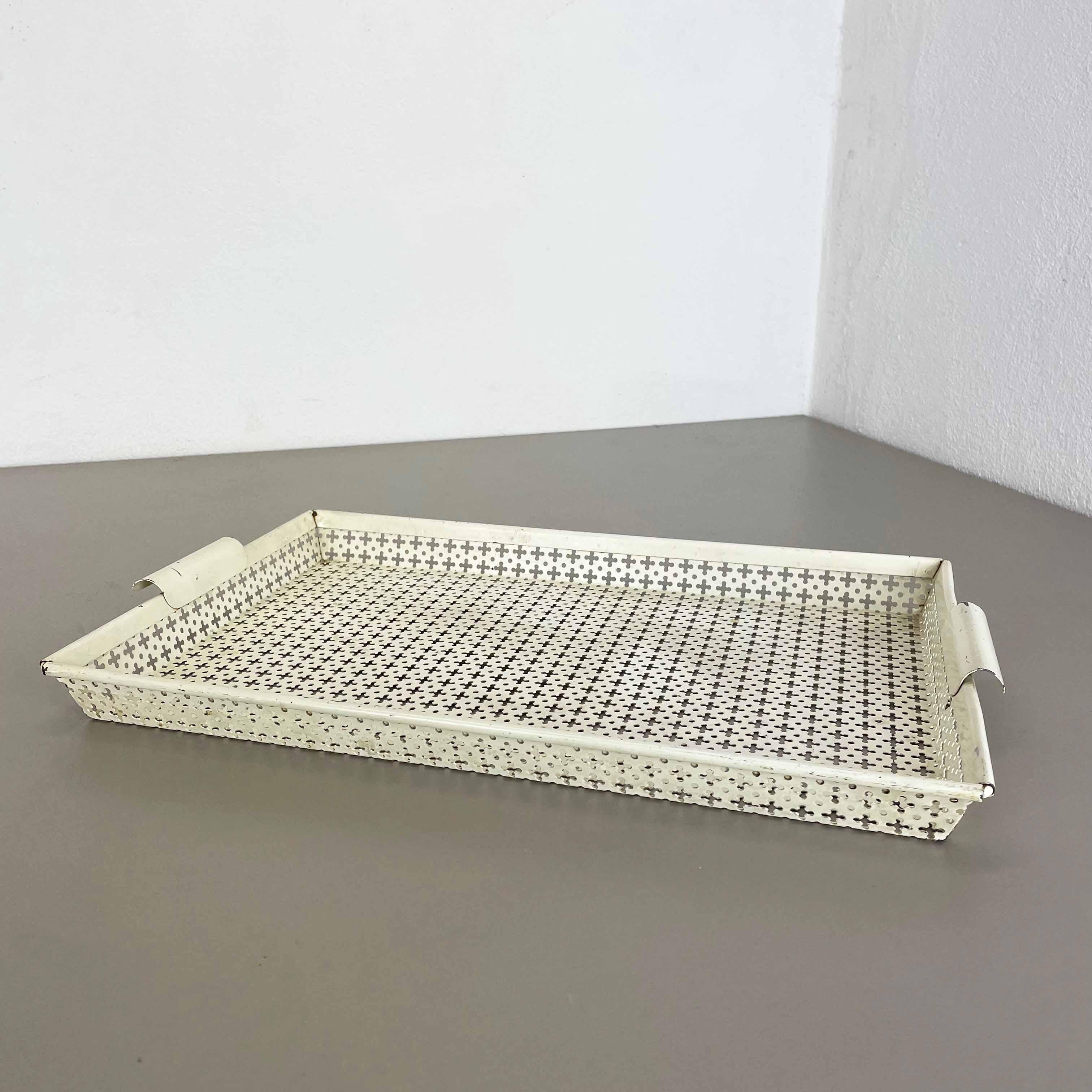 Metal tray.

Designed and produced by Mathieu Matégot.

Origin: France, 

1950s.

Original Mathieu Matégot tray 