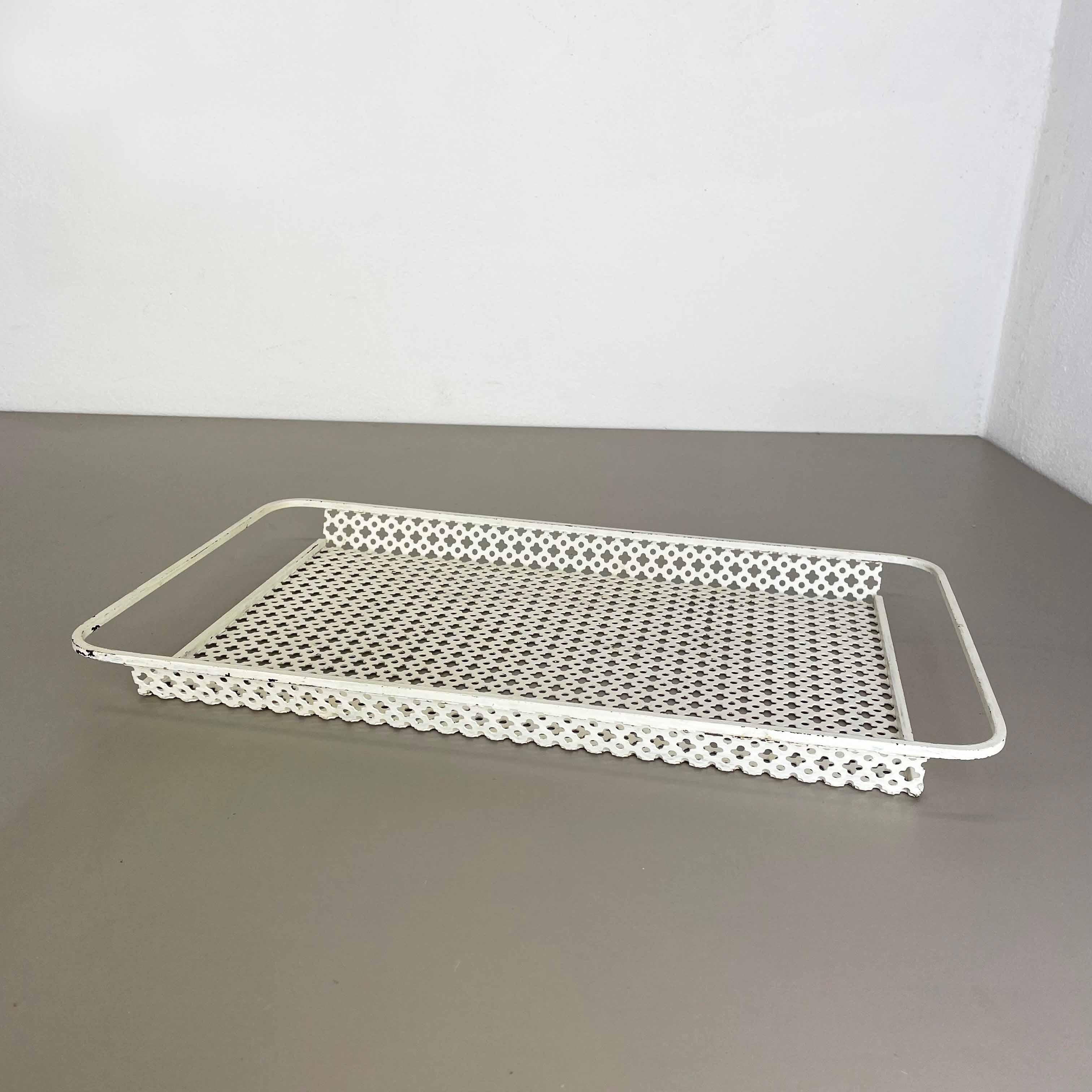 Metal tray.

Designed and produced by Mathieu Matégot.

Origin: France, 

1950s.

Original Mathieu Matégot tray 