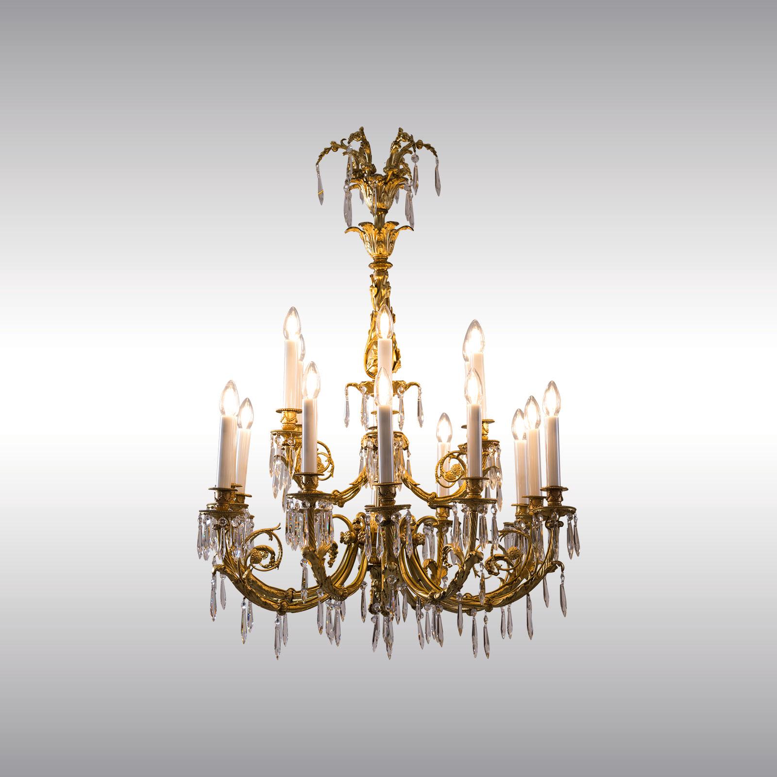 Magnificient chandelier in Baroque-style from 1880, originally for candles, later electrified. Casted, chased and gildet brass, excellent craftswork 18 lights.

  