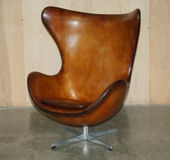ORIGINAL FULLY RESTORED 1968 FRITZ HANSEN EGG CHAiR & FOOTSTOOL IN BROWN LEATHER