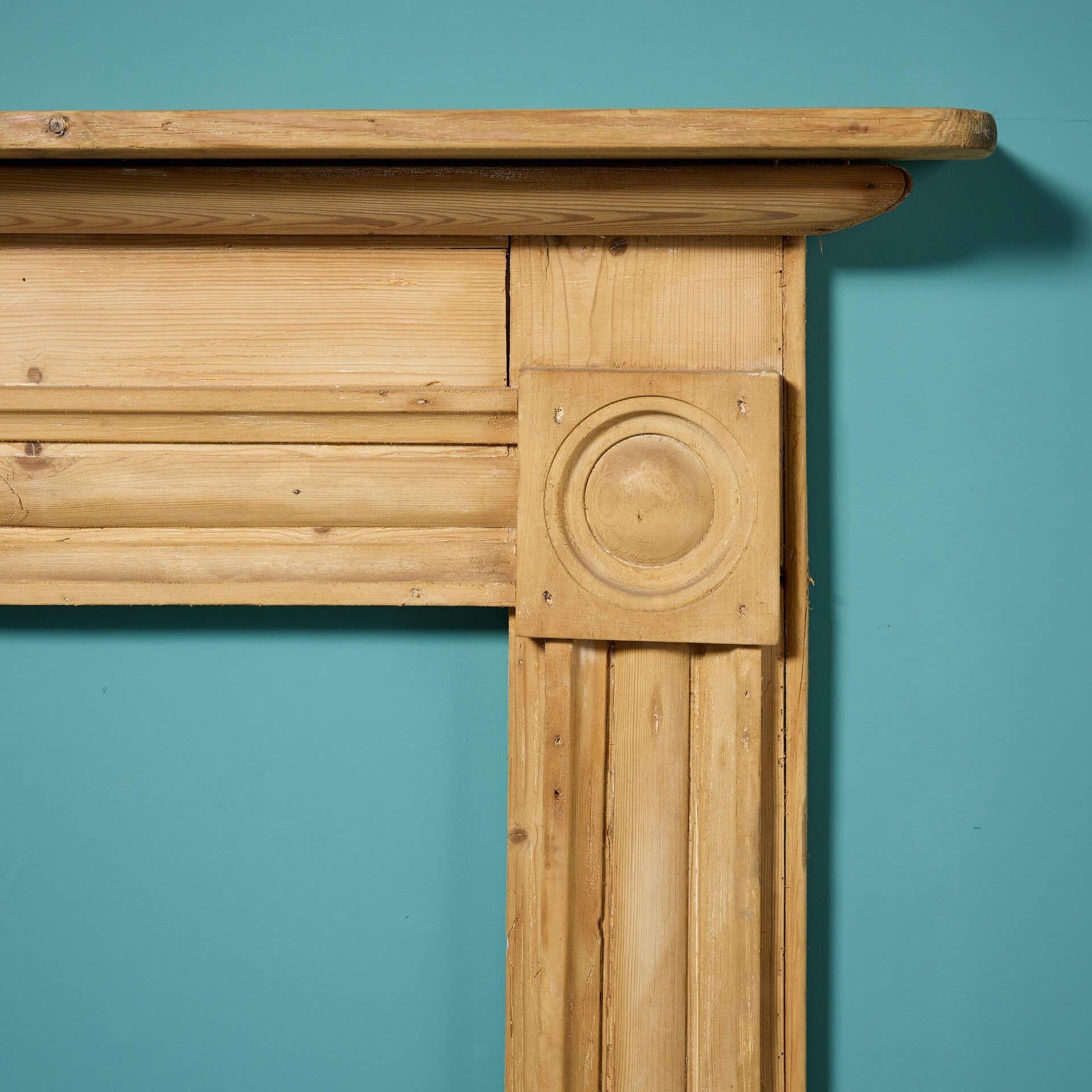 English Original Georgian Stripped Pine Bullseye Fire Mantel For Sale