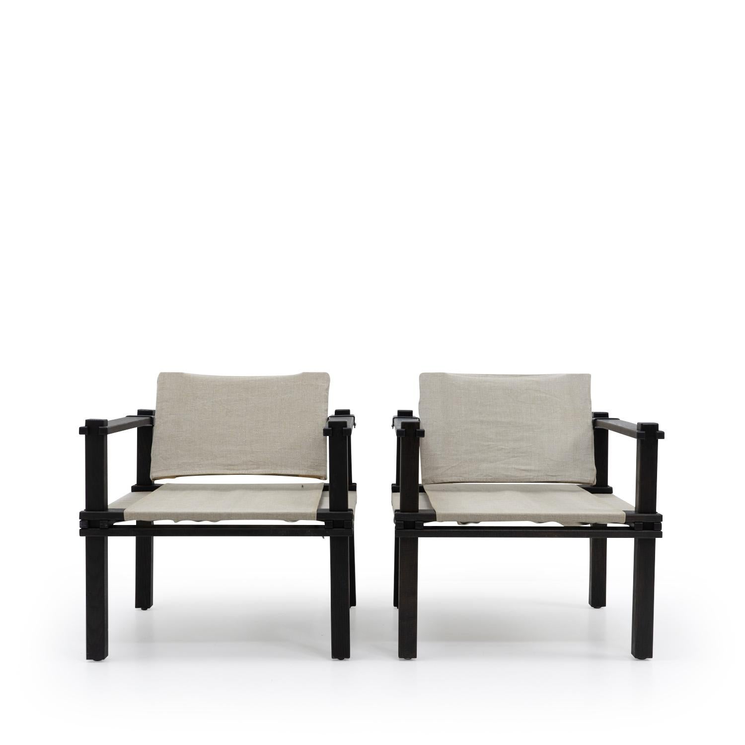 These two armchairs, designed by Gerd Lange, are part of the Farmer furniture series produced by Bofinger starting in 1965. Known for their easily disassembled design, the Farmer series also includes a table, cabinet, and bed. 

The armchairs are