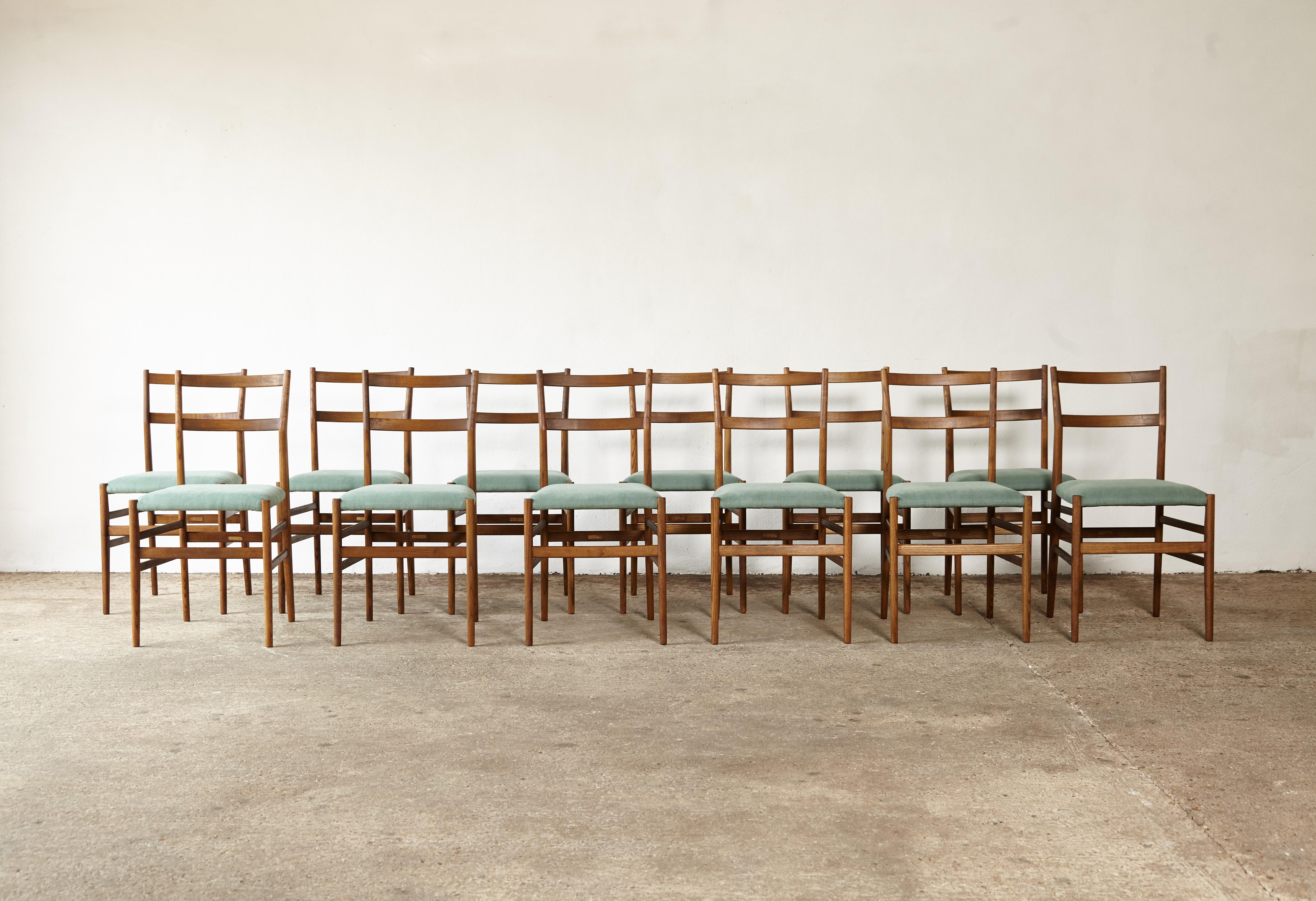 A wonderful set of twelve original Gio Ponti Leggera Model 646 dining chairs, Cassina, Italy, 1950s.  In restored condition with new upholstery.  All with makers label marked 'Figli di Amedeo Cassina' under each seat.    Ships worldwide.

 