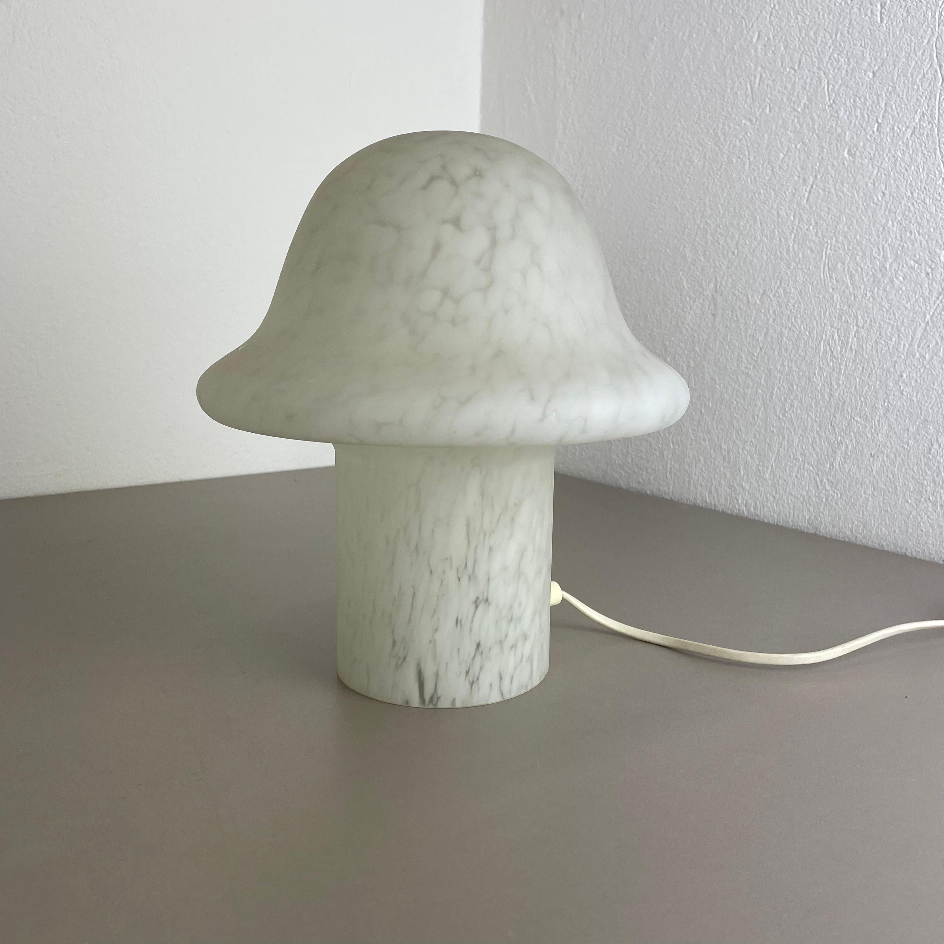 Article:

Mushroom desk lamp

Producer:

Peill & Putzler, Germany

Age:

1970s


Description:

Original desktop light made in the 1970s by Peil & Putzler in Germany. the shade in made of glass in form of a mushroom, with diameter of