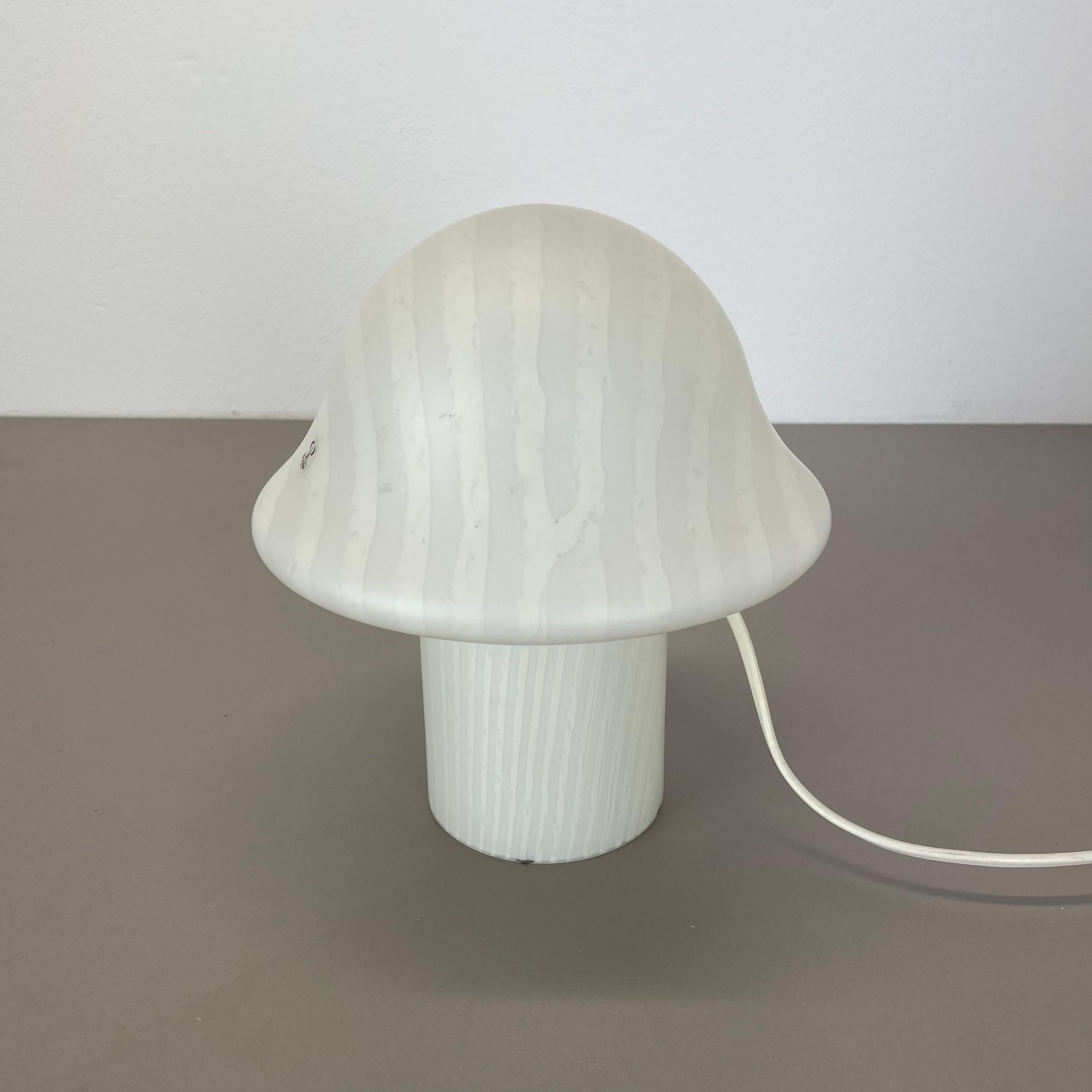 Article:

Mushroom desk lamp

Producer:

Peill & Putzler, Germany

Age:

1970s


Description:

Original desktop light made in the 1970s by Peil & Putzler in Germany. the shade in made of glass in form of a mushroom, with diameter of 20cm of the top.