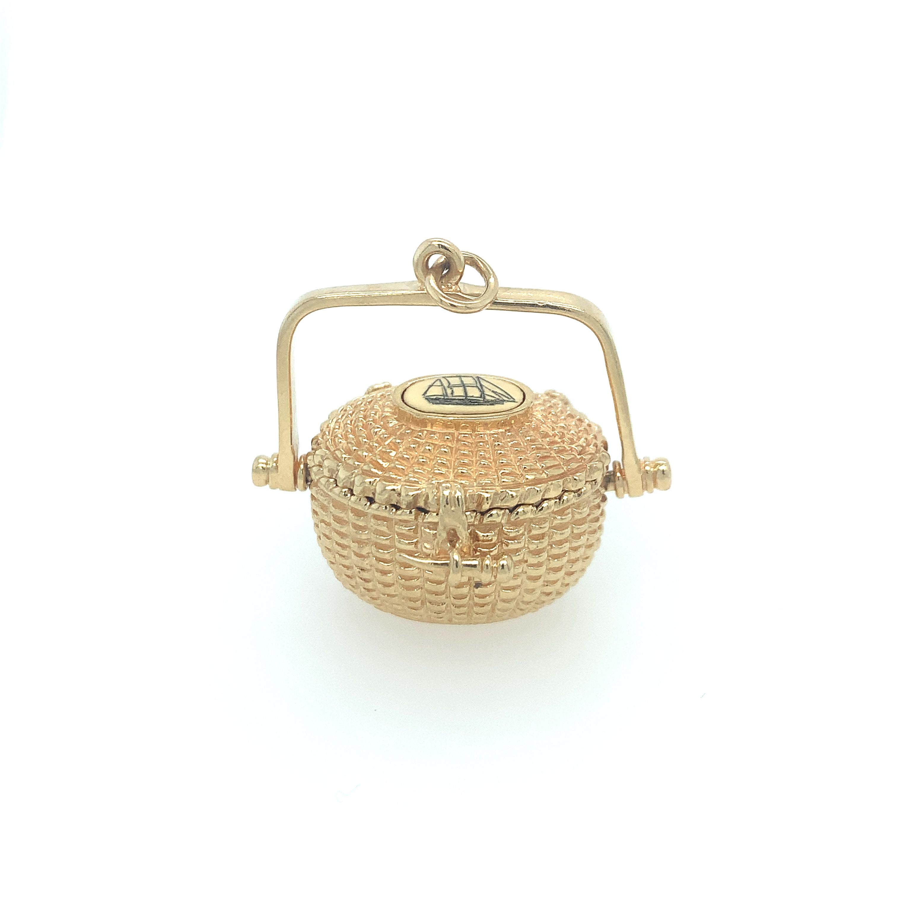 In 1977, Glennan Robbins designed the first gold Nantucket lightship basket. A delicate sailboat is featured on an oval field atop the lid. An example of intricate design, this Nantucket basket features a swinging handle, a working lid, and an oval
