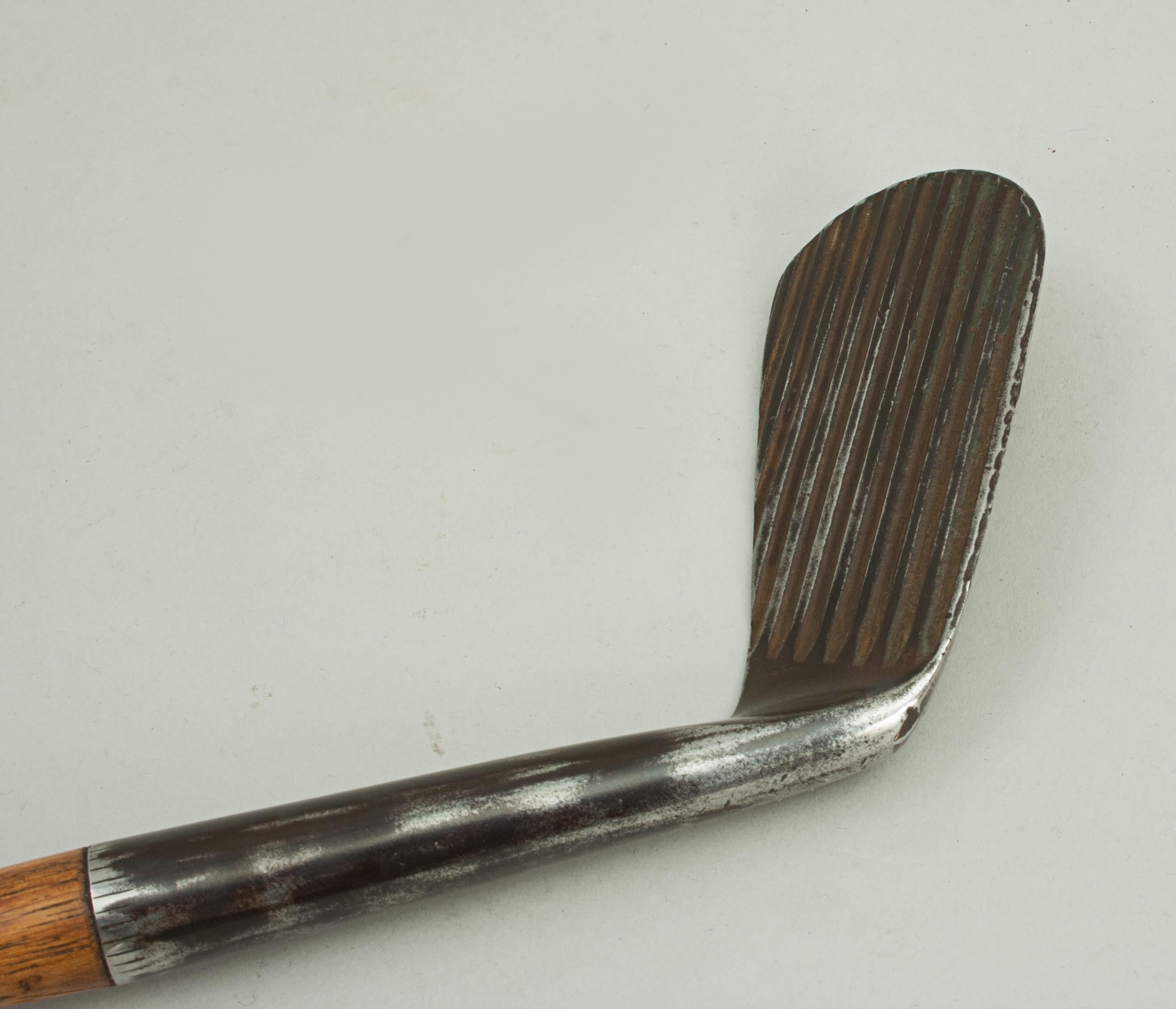 A great left-handed backspin golf club by Hillerich and Bradsby Co. Louisville, Kentucky. Also stamped 'PAR - X - L' and' Hand Made' with logo. There are also the initials H.B and the shaft has the maker's name and place stamp.
A fine collector's
