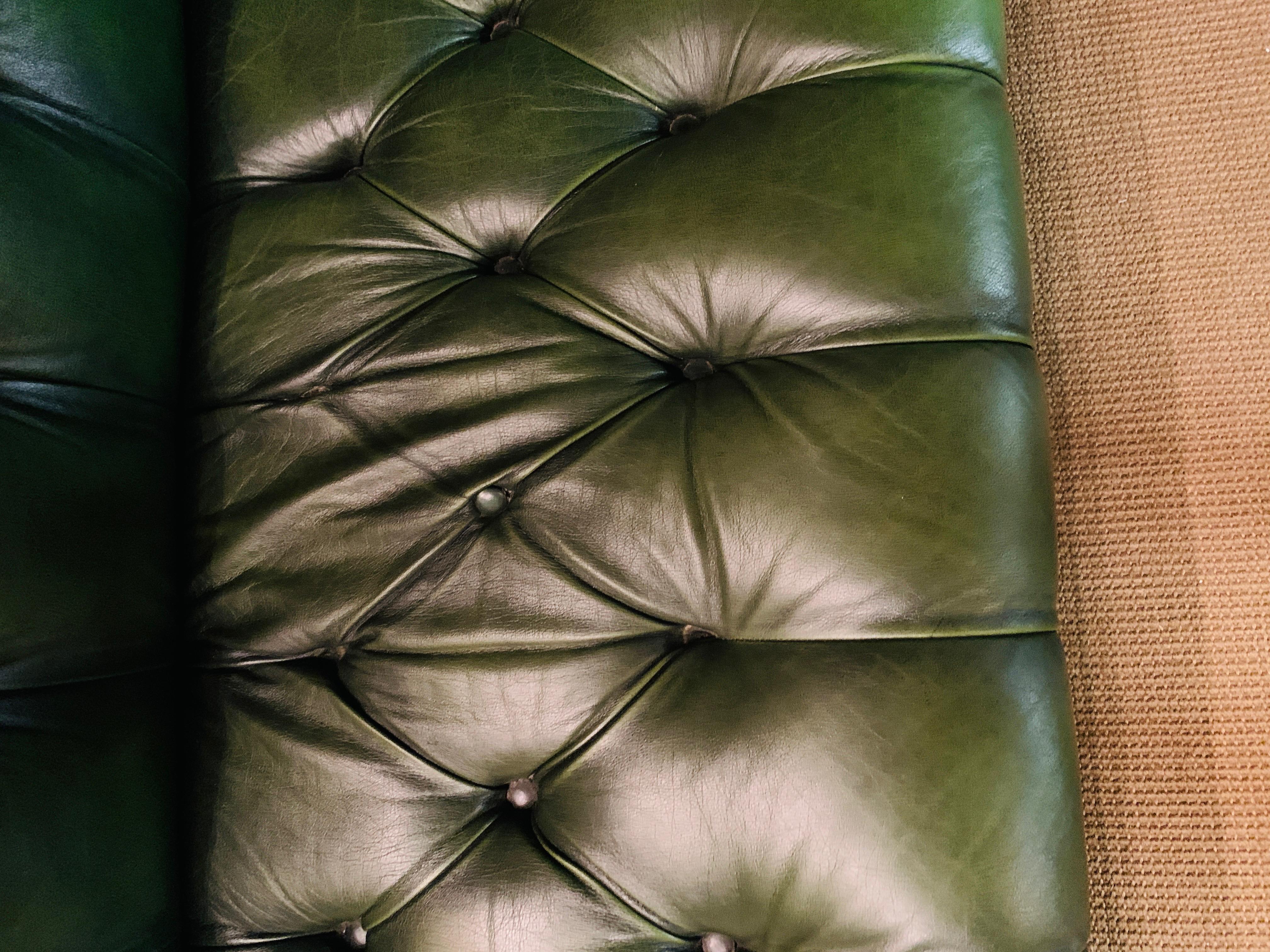 green chesterfield sofa leather