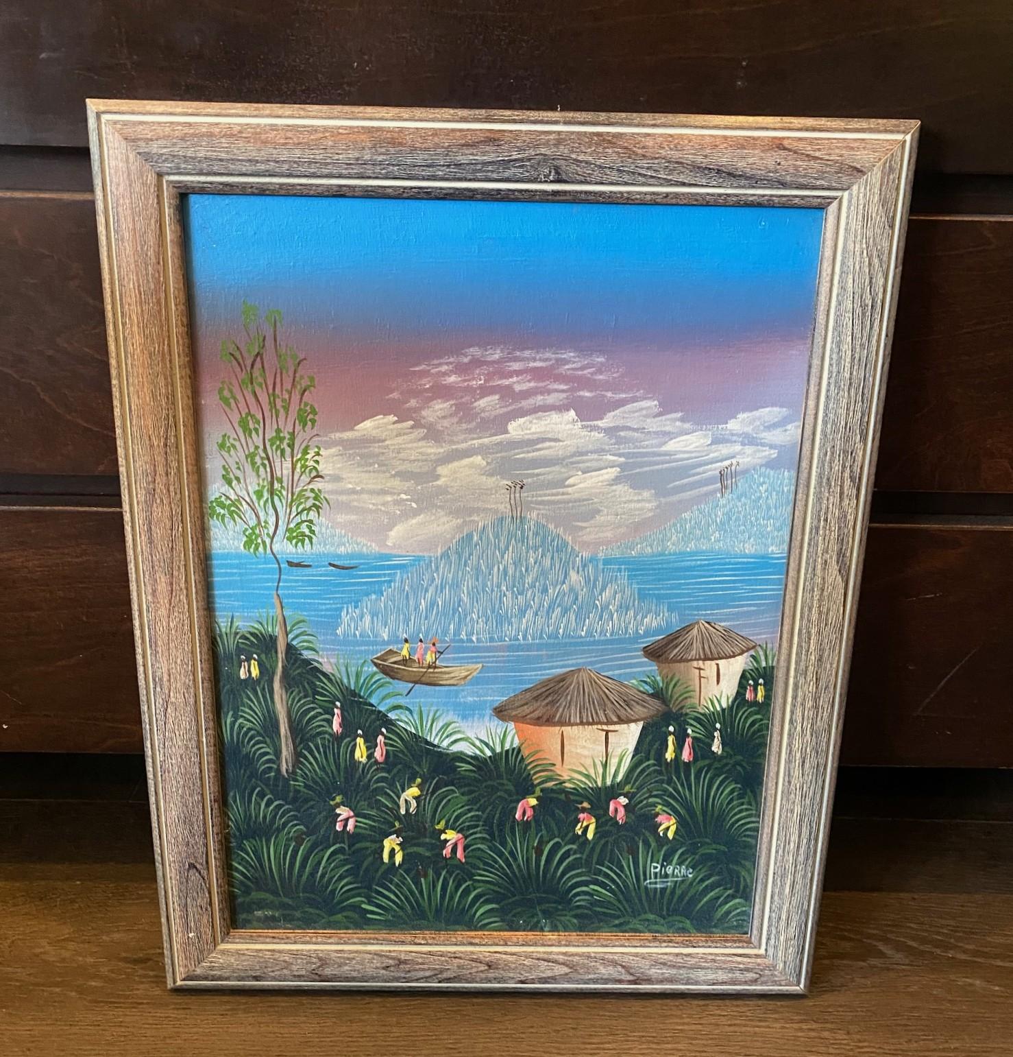 Une peinture originale d'art populaire haïtien magnifiquement colorée et merveilleusement composée.  Cette œuvre représente un paysage de village côtier tranquille, avec des habitants repérés dans la campagne, une île juste à côté du rivage et des