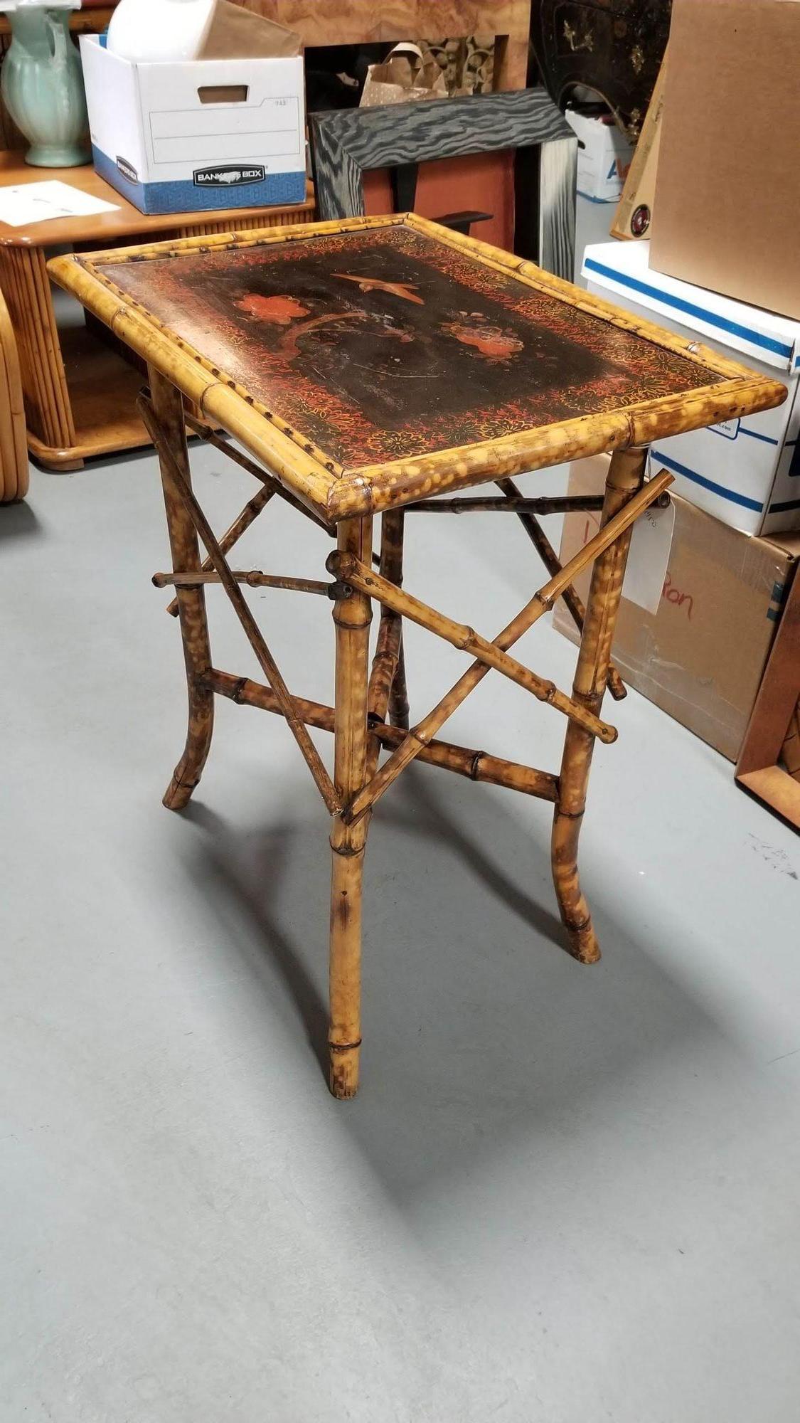 Turn of the 20th Century Aesthetic Movement tiger bamboo pedestal side table with a hand-painted scenic top portraying a bird with floral scenery, a large square top, and crop 
