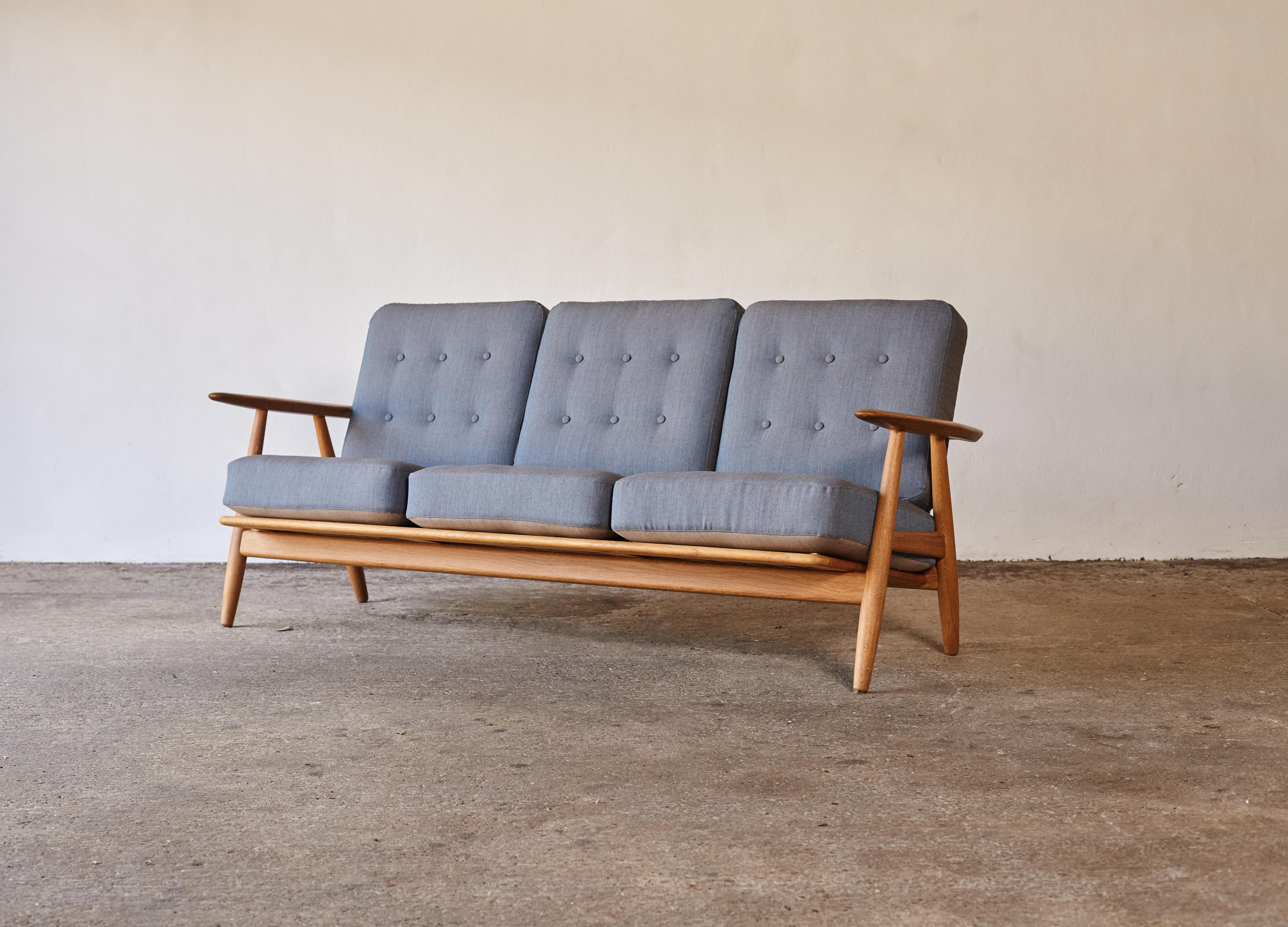 An oak GE-240 cigar sofa designed by Hans J. Wegner and produced by GETAMA, Denmark. The oak frame is in excellent vintage condition. Original sprung cushions, newly upholstered in Kvadrat fabric.





UK customers please note:    displayed prices