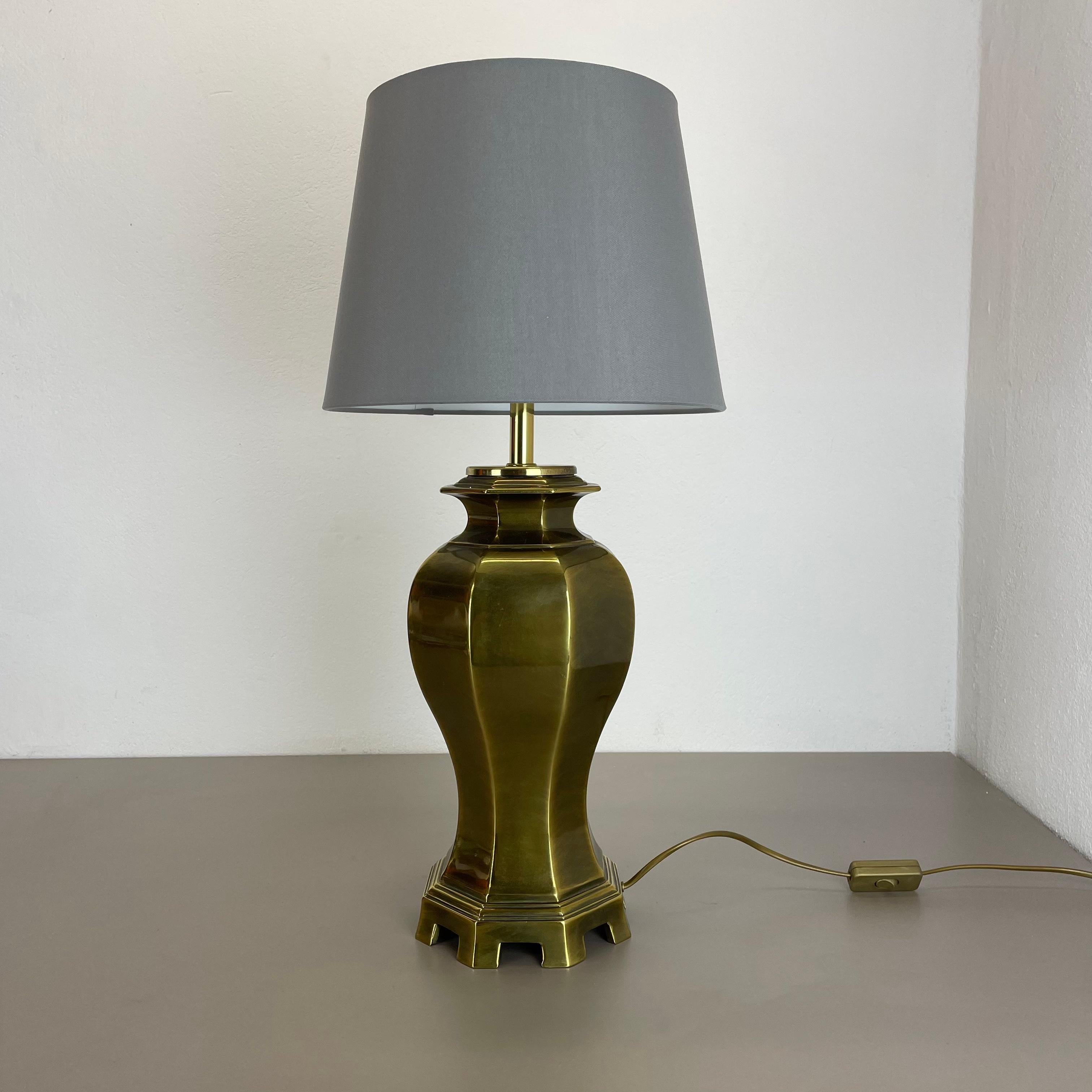 Article:

modernist brass table light 


Origin:

Italy


Decade:

1970s



This original vintage light was designed and produced in the 1970s in Italy. The light is made of brass with a nice formed elegant Hollywood Regency style
