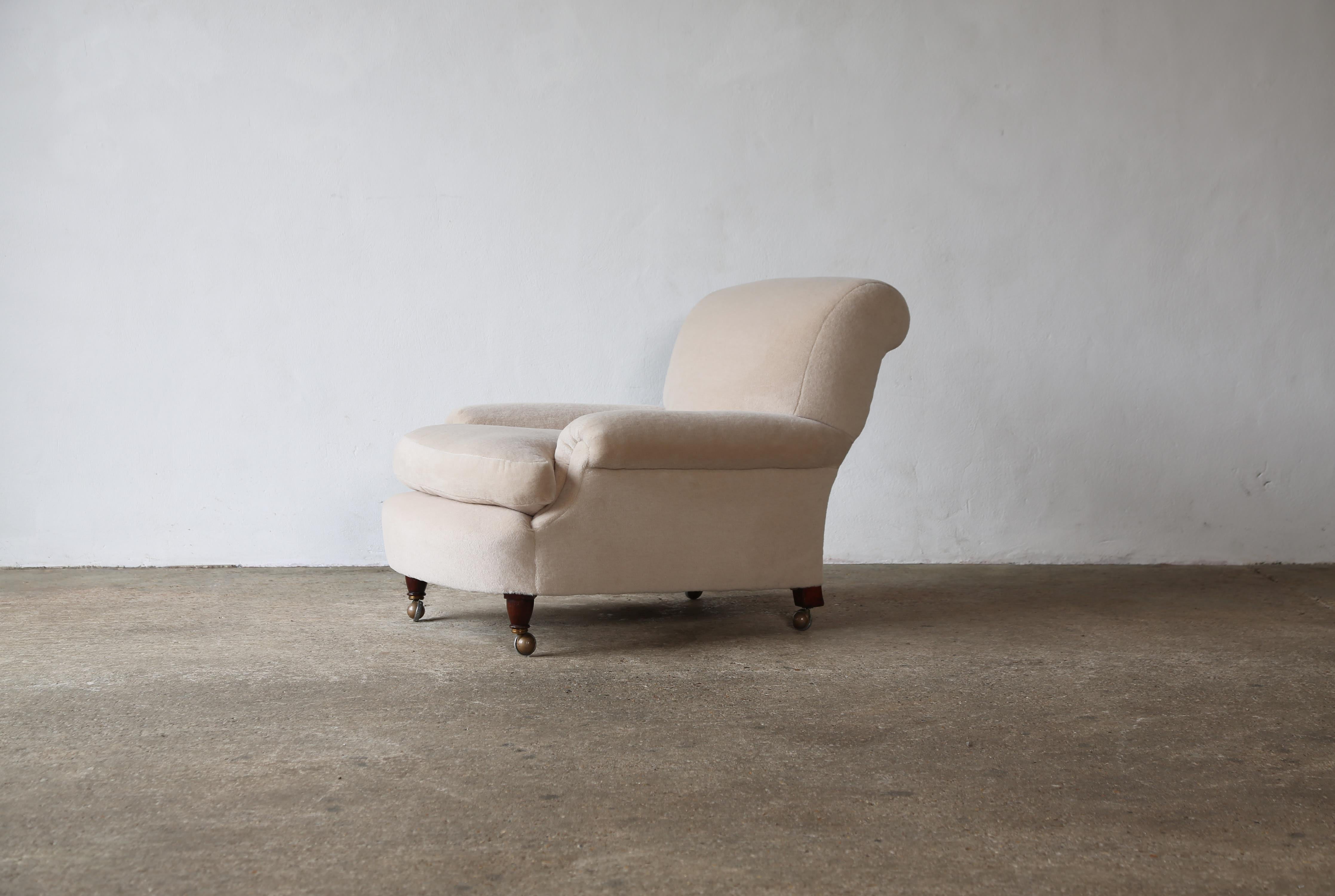 A Howard & Sons era armchair, produced by William Birch, England, 19th Century. Stamped to the back leg.   Structurally sound.   Newly upholstered in premium, pure Alpaca.  Fast shipping worldwide.