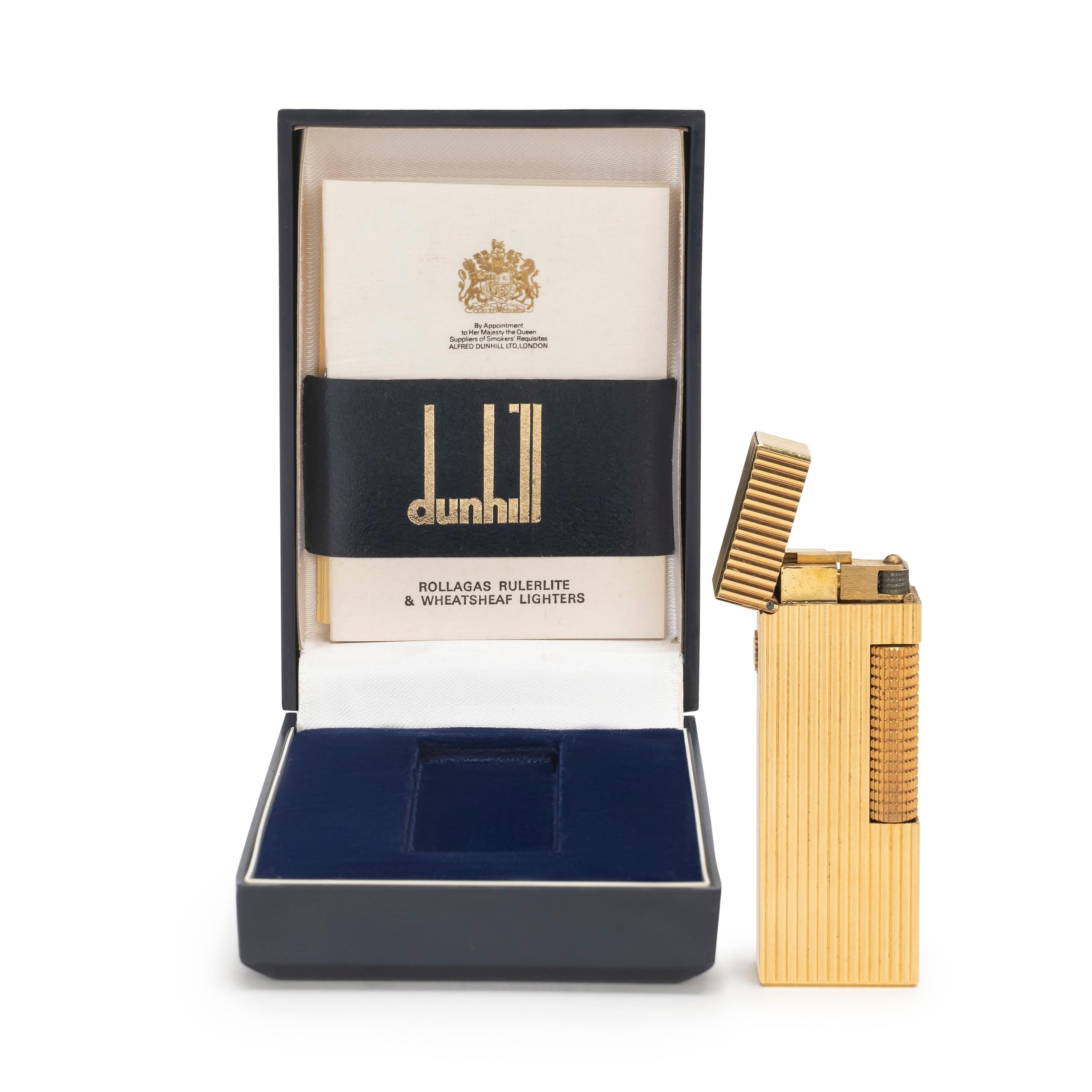 Rare Iconic Vintage and Elegant Dunhill Gold Swiss Made Lighter.
As seen in the James Bond film. 
Dunhill gold plated Swiss Made lighter In mint condition.
Works perfectly. 
Iconic and beautifully engineered piece in rare condition.
In original blue