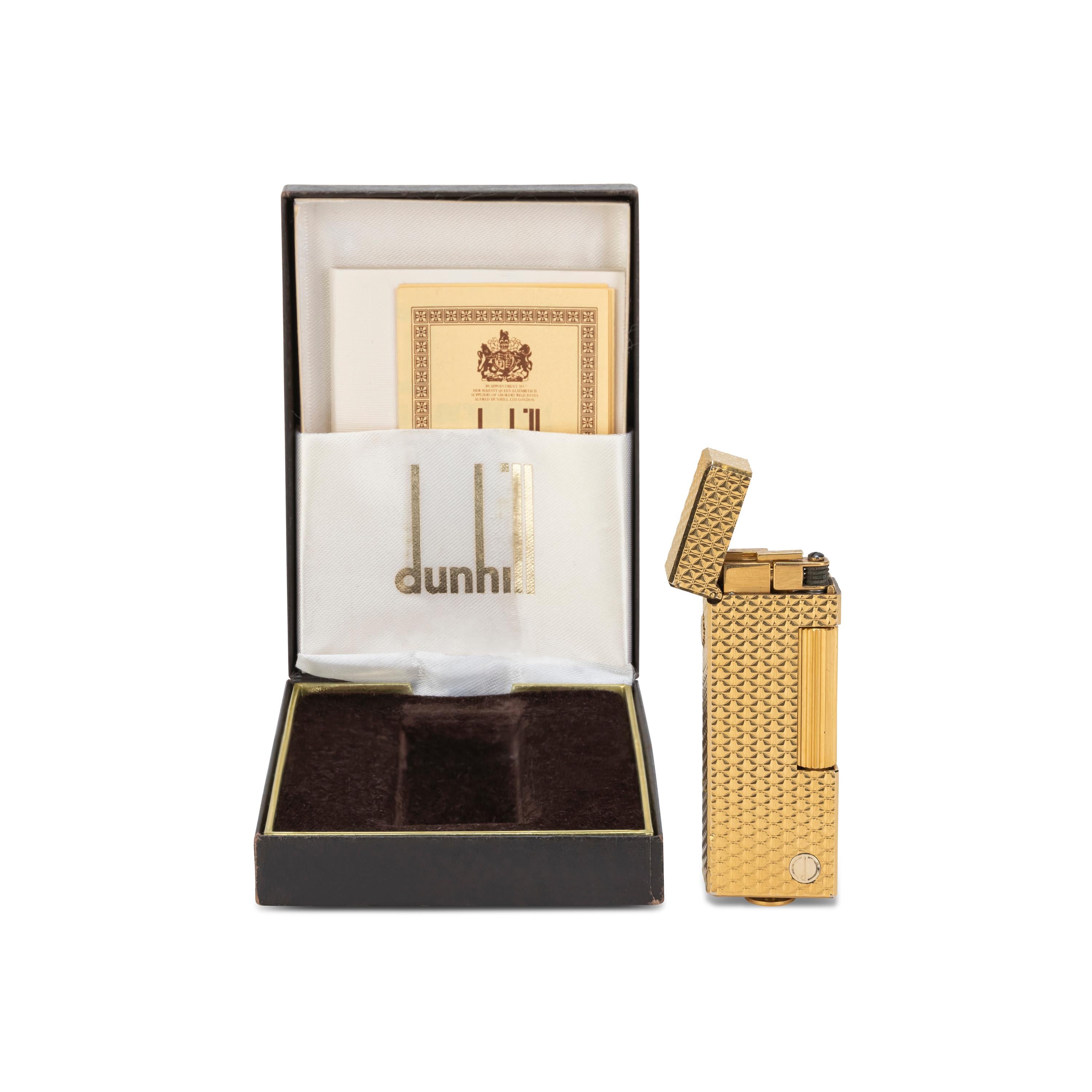 Rare, Iconic, chic and Elegant Dunhill Gold Plated Swiss Made Lighter.
Seen in the “James Bond” films. 
In mint condition. 
Works perfectly. 
Iconic and beautifully engineered piece in rare condition.
In original dunhill Black box and Brown velvet
