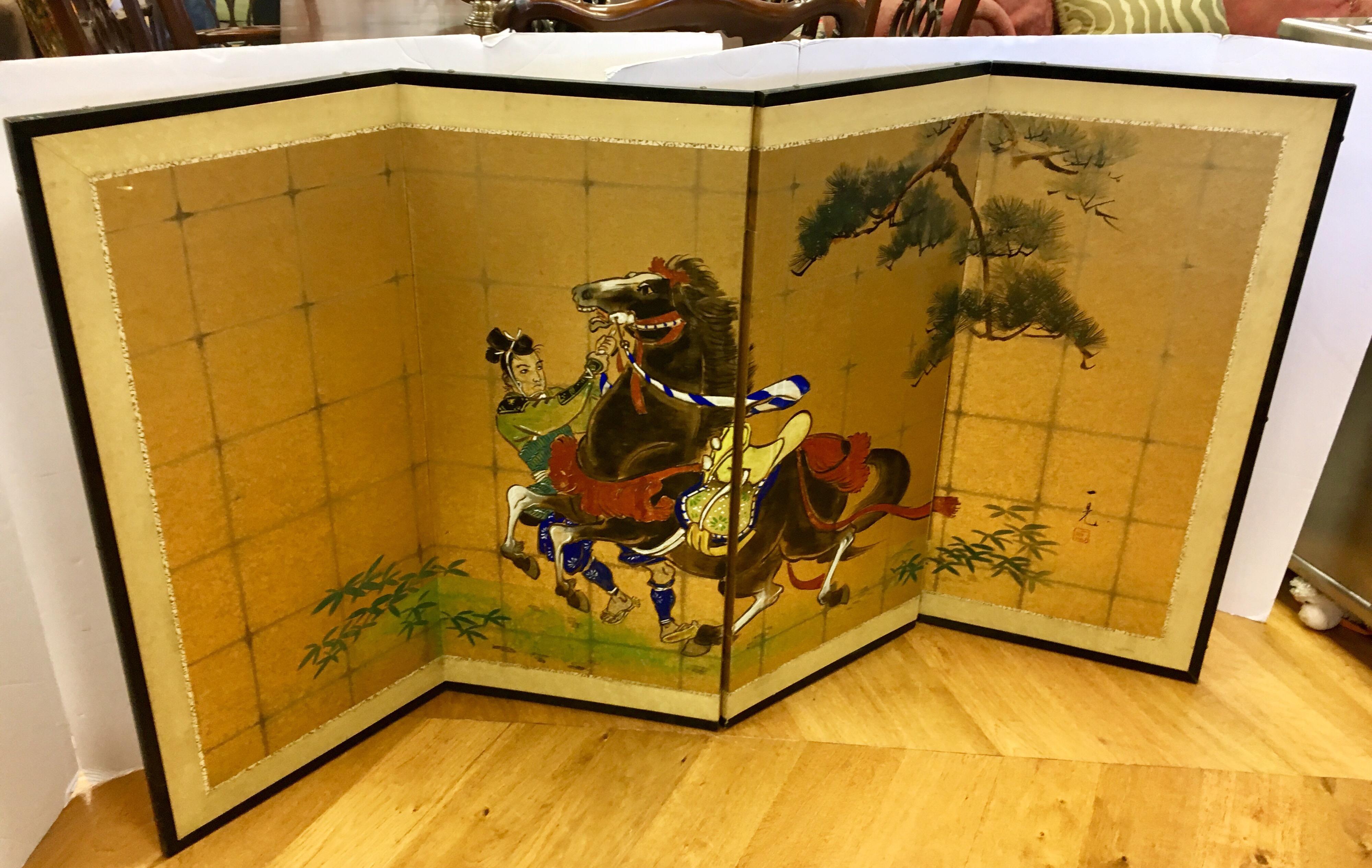 A highly unique Japanese four-panel screen done with painted paper, decorated with a samurai figure and wild horse, inset within a wooden frame. This piece is in very good condition, with age appropriate wear and a few small tears - see pictures.