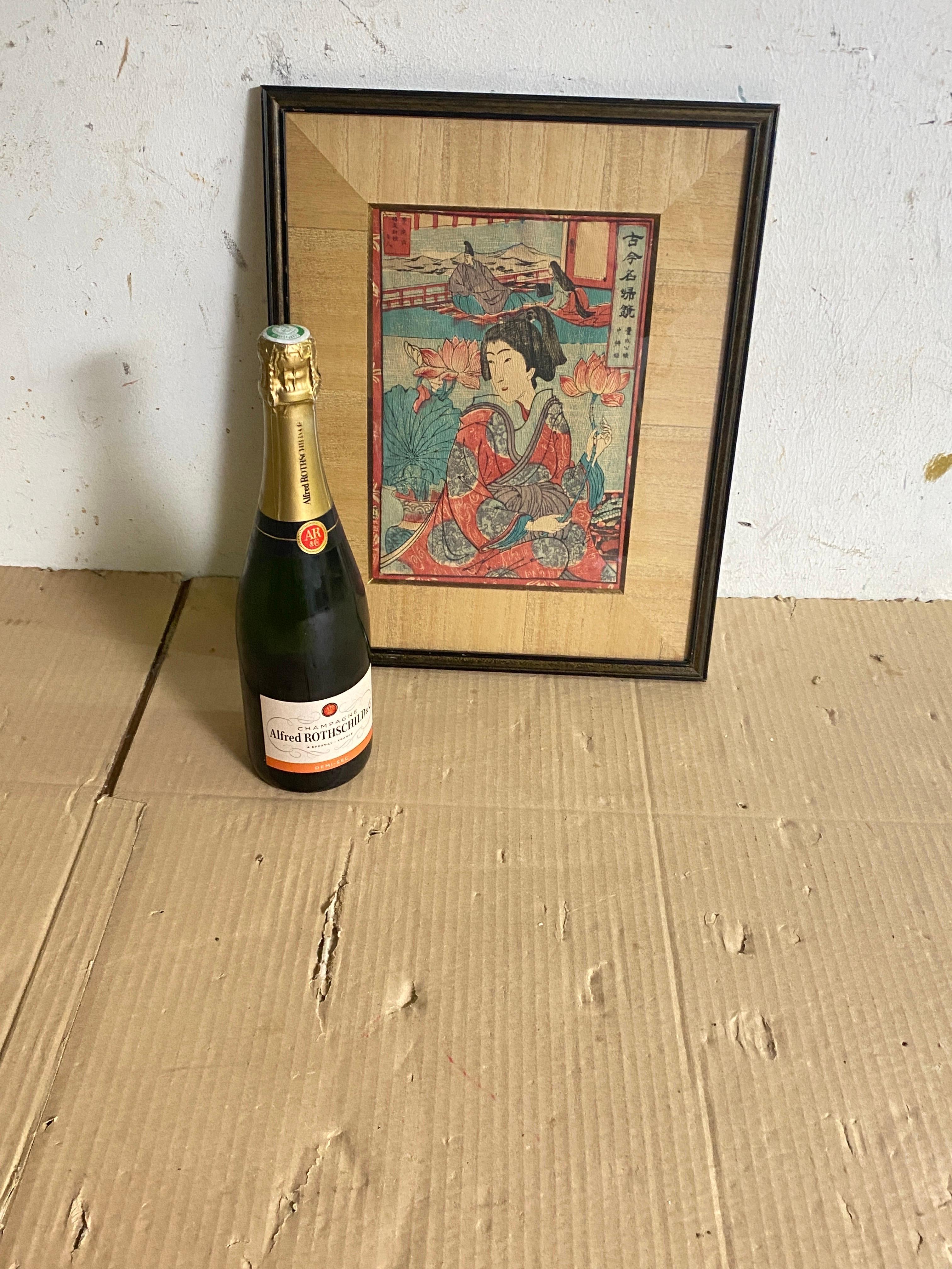 Rare, original  19th century woodblock print. Beautiful Edo period print from the original publisher. Quality framed with conservation glass in an black painted frame. 
Red Blue Green Colors.
