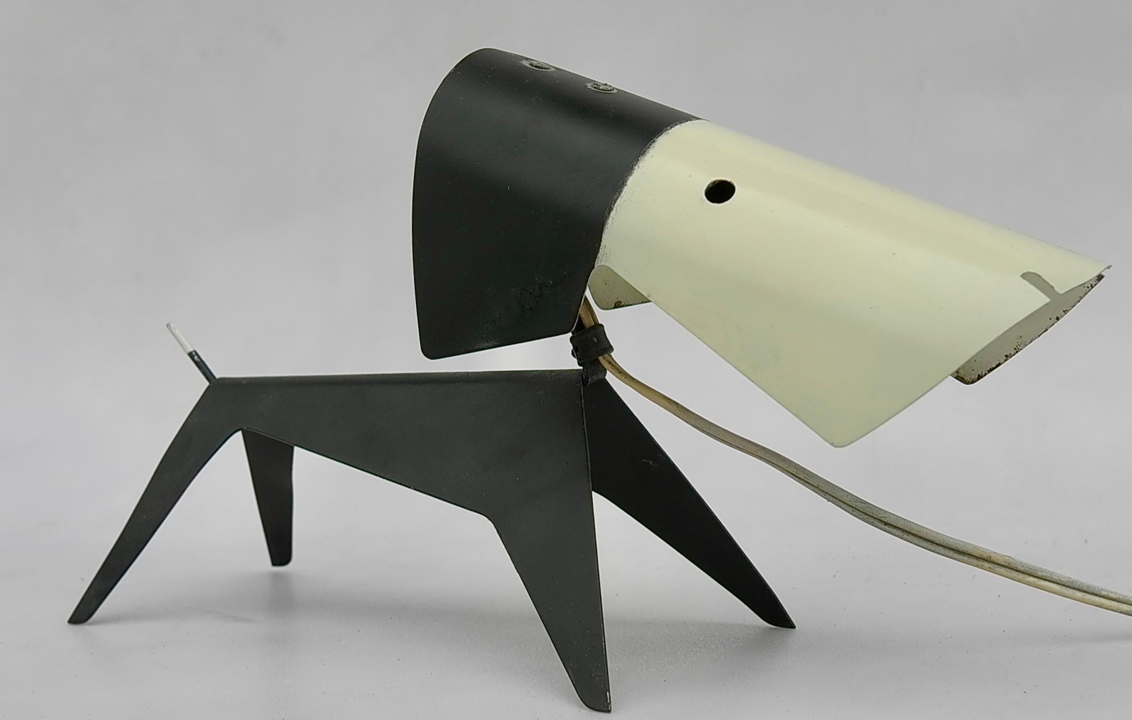 Original Jean Boris Lacroix dog lamp by Disderot, France, 1950

The original lamps can be easily recognized from the replicas, this one also has its original black plastic black necklace that the replicas never have.