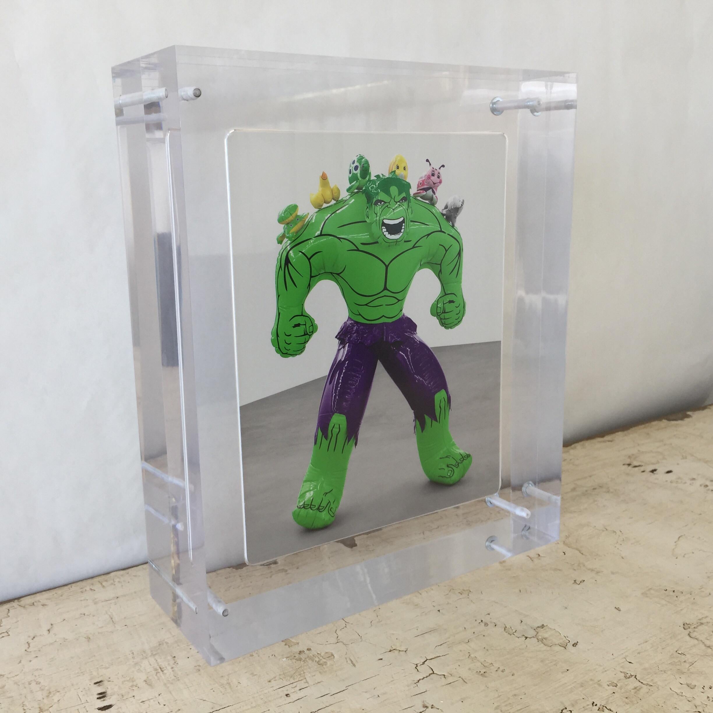 Accompanied with Gagosian catalogue of Featured Exhibitions; this four inch acrylic encases the original invitation announcement to Jeff Koons: Hulk Elvis exhibition (Signed). This giant block will display beautifully like a piece of art adding to