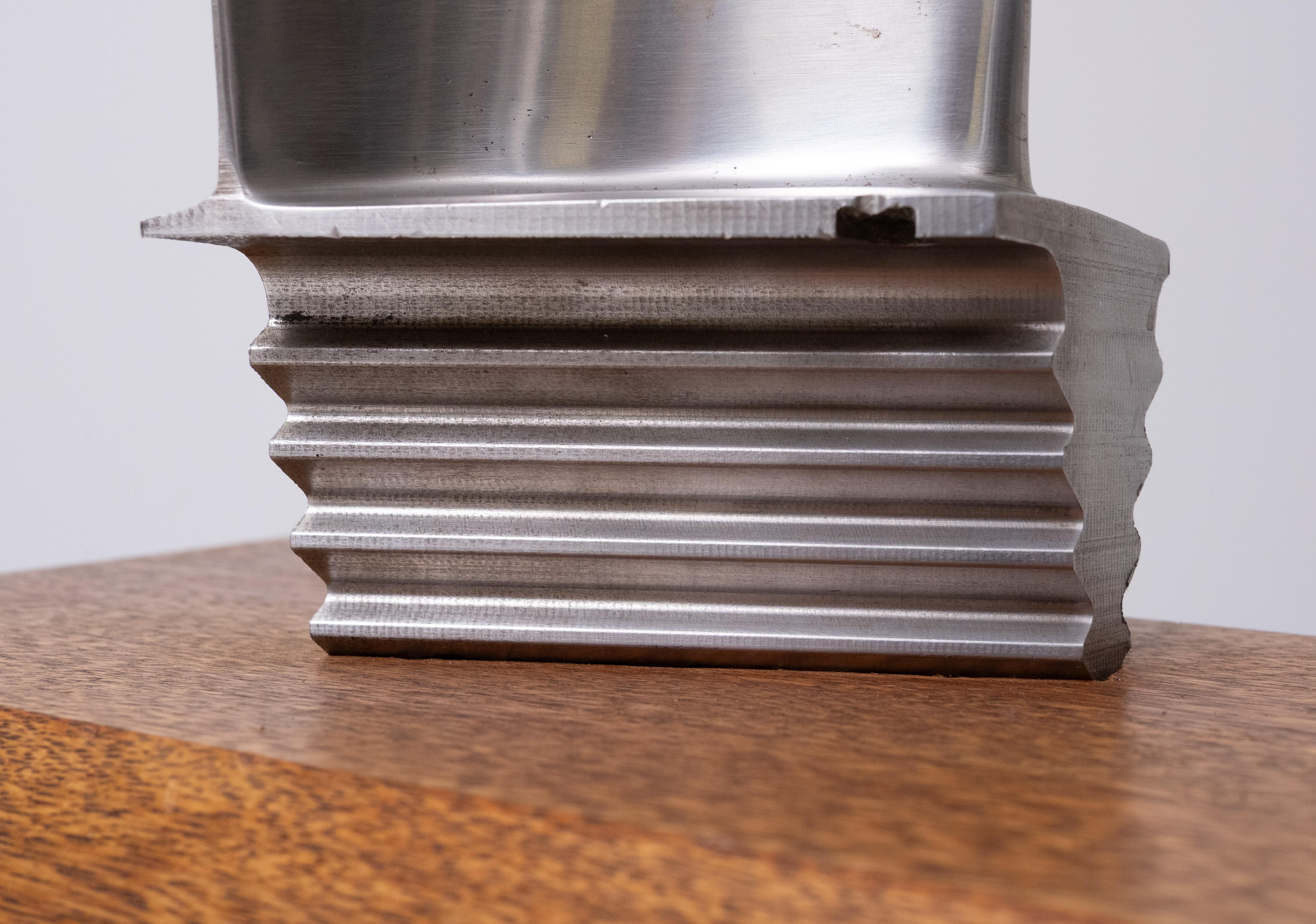 Original jet engine or turbine window (blade) on a thick solid Oak ...
