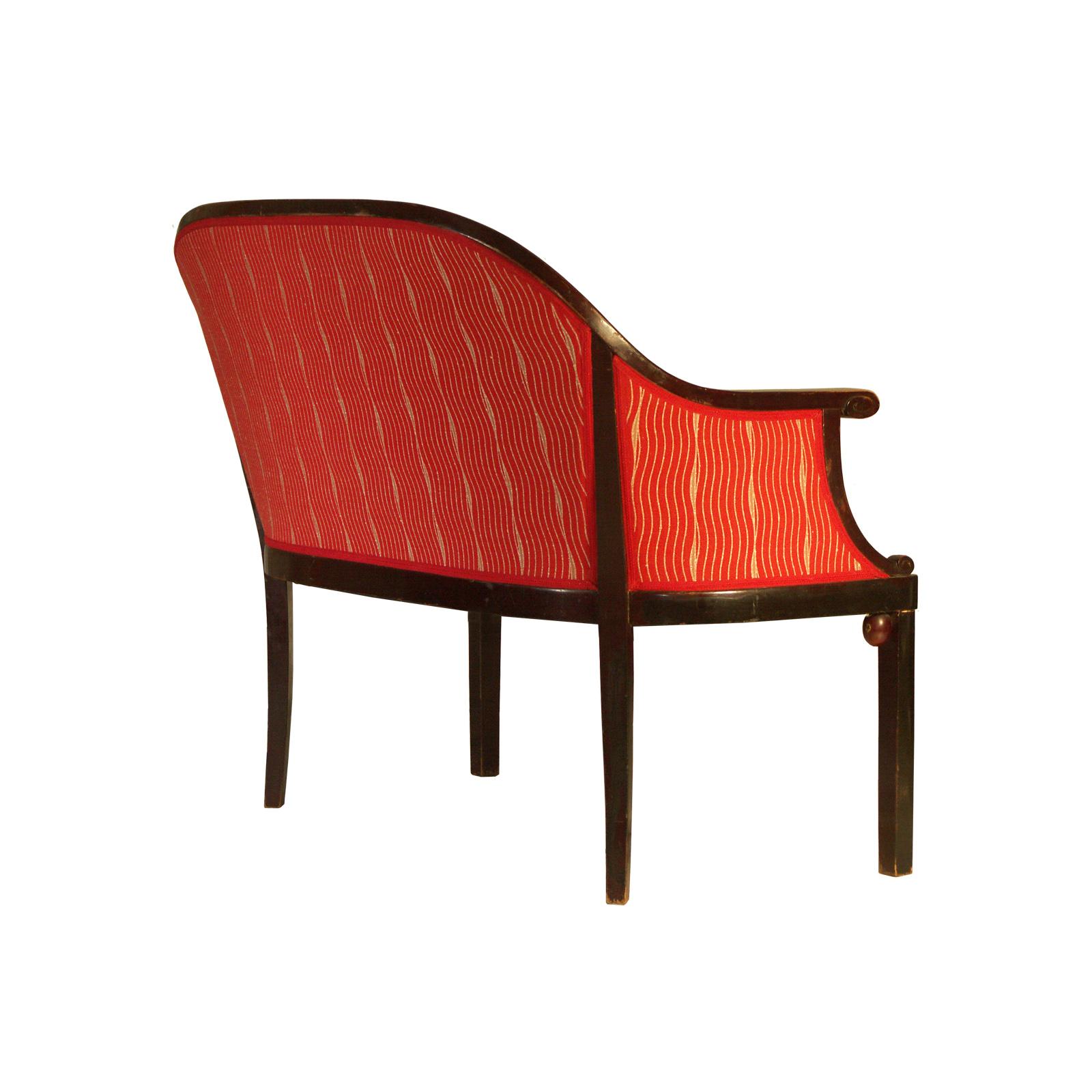 Attributed to either Josef Hoffmann or Otto Prutscher as both of the designers did similar objects in bentwood at this time, and both were using balls or olives for joining the legs with the body of a furniture. Upholstery renovated.