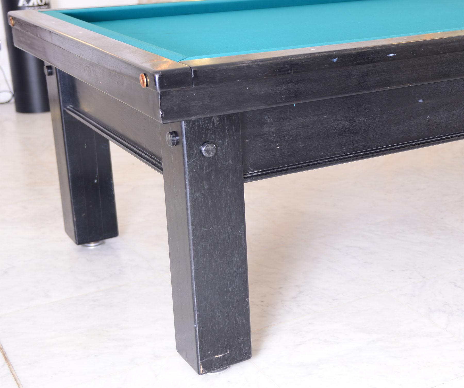 Early 20th century, similar to the Carambol billard table designed by Josef Hoffmann in 1903 for the Purkersdorf Sanatorium - see the enclosed image.

There are just minor chips and scratches on the surface, which is easily done in a few hours