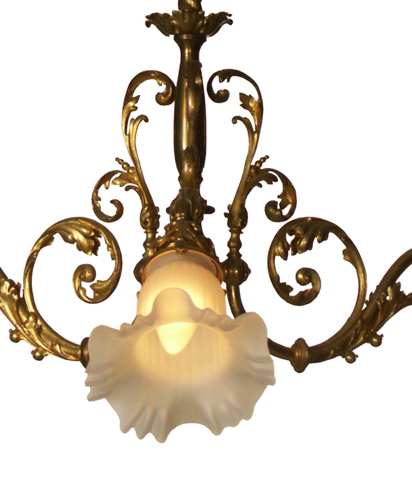 Around 1900 in Vienna the private houses were connected to the electricity grid. At that time the common gaslights were changed to the new technology. As well new chandelier were built for electric light only. This typical Viennese chandelier has