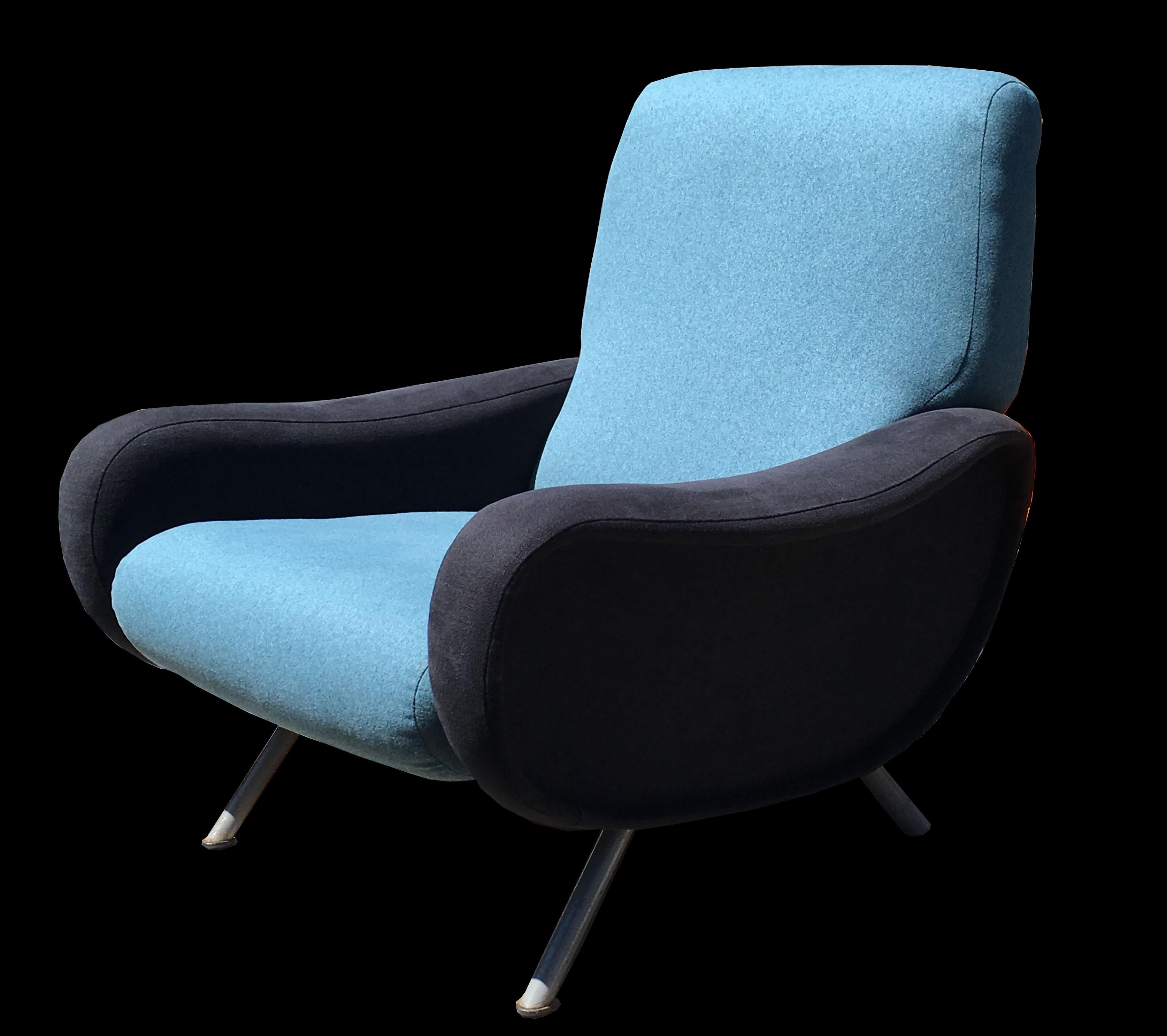 An original lady chair by Marco Zanuso for Arflex with fresh new upholstery in teal blue and black, in perfect condition.