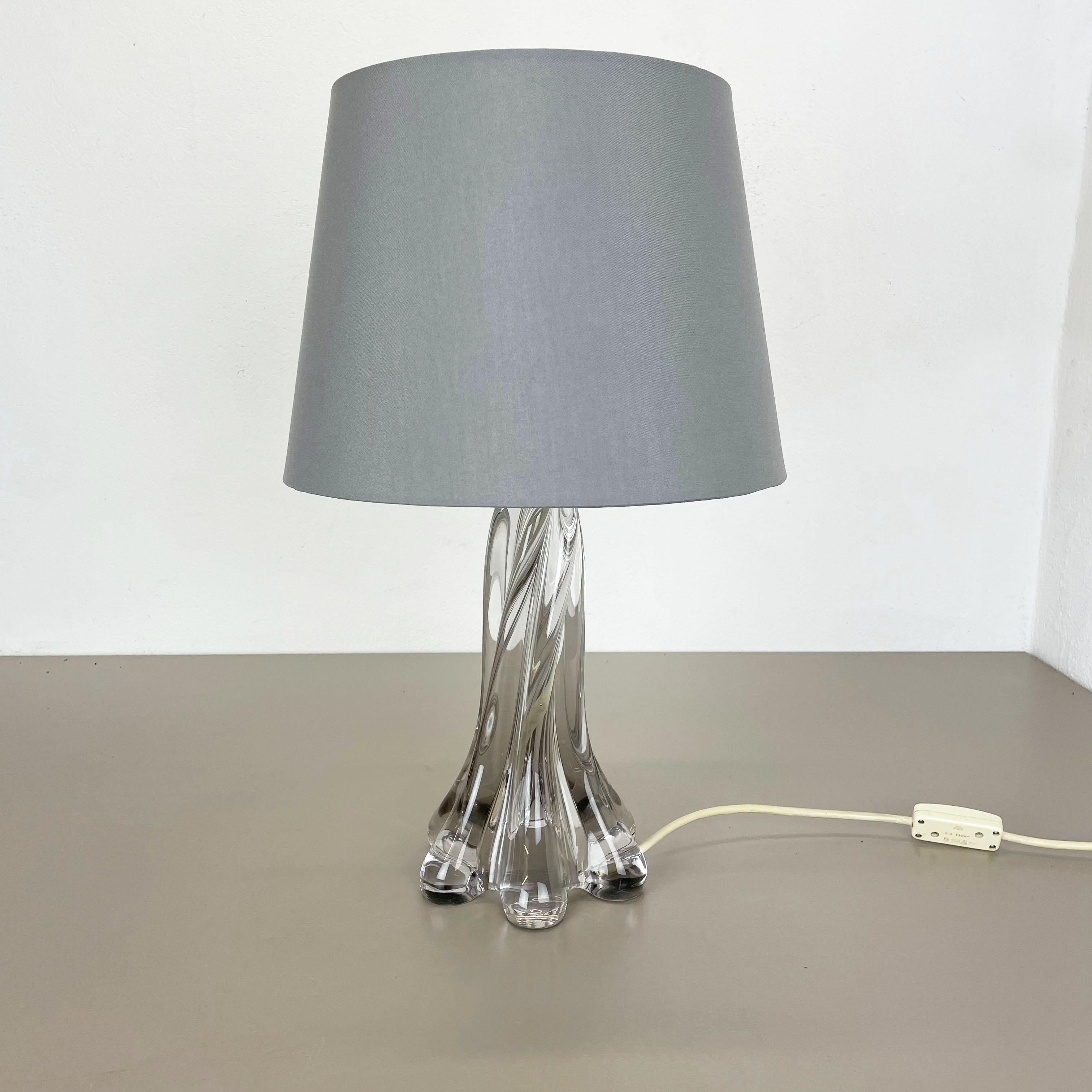 Article:

Table light desk top light


Origin:

Murano, Italy


Age:

1970s




Description:


This fantastic vintage table light base was designed and produced in the 1970s in Murano, Italy. The light base is made of high quality Italian Murano