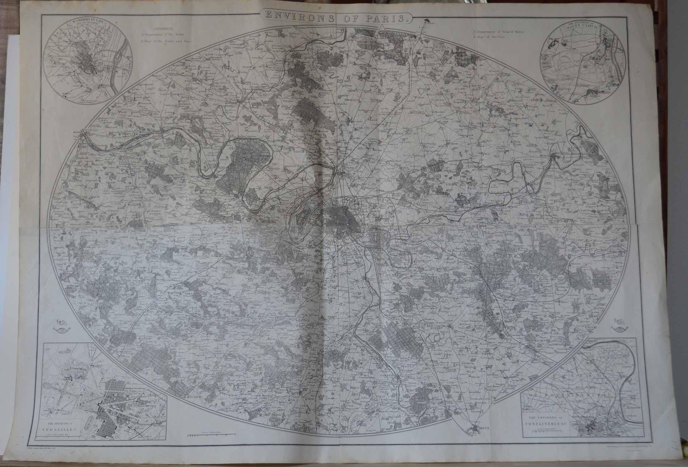 Fabulous monochrome map of Paris.

Vignettes of St Germain En Laye, Saint Cloud, Versailles and Fontainbleau.

Unframed.

Drawn by J.Dower.

Lithography by Weller. 4 sheets joined together.

Published, 1861

Good condition. No