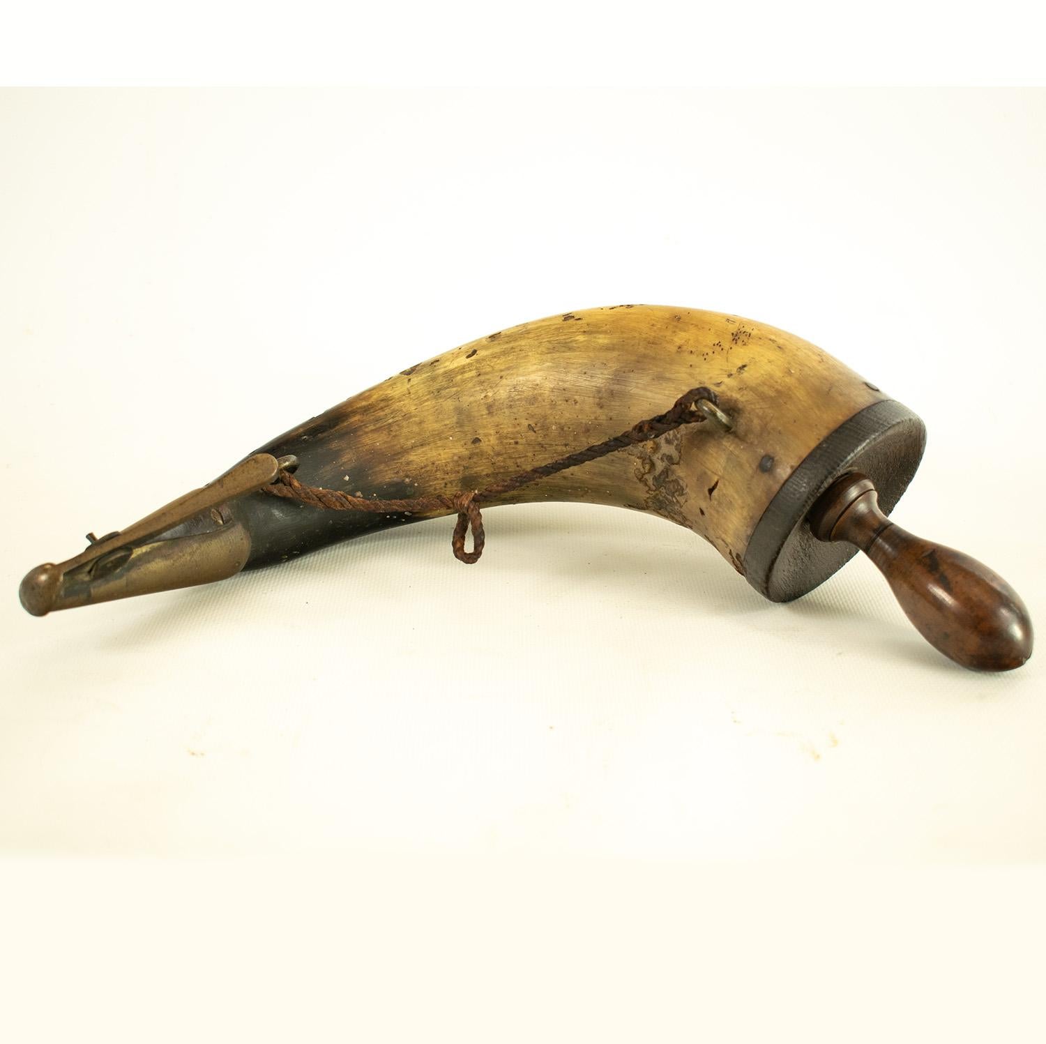 Original Large French Gunner's Powder Horn, Naval - French, late 18th century. Of large size used to load cannons aboard ship.

With fitted wooden plug and brass dispensing spout.

The French Naval Gunner's Powder Horn was used for priming cannons